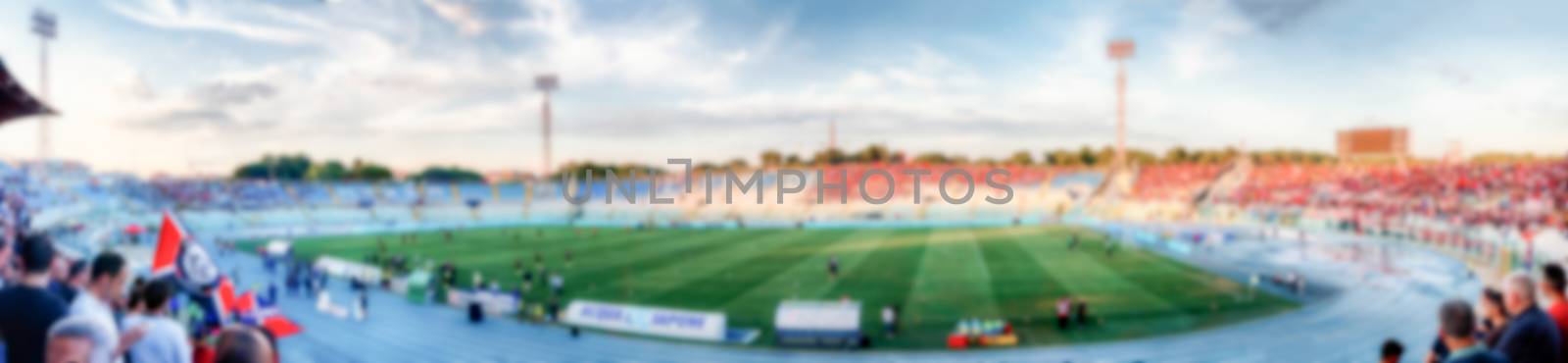 Defocused Background of a football stadium. Intentionally blurred post production for bokeh effect