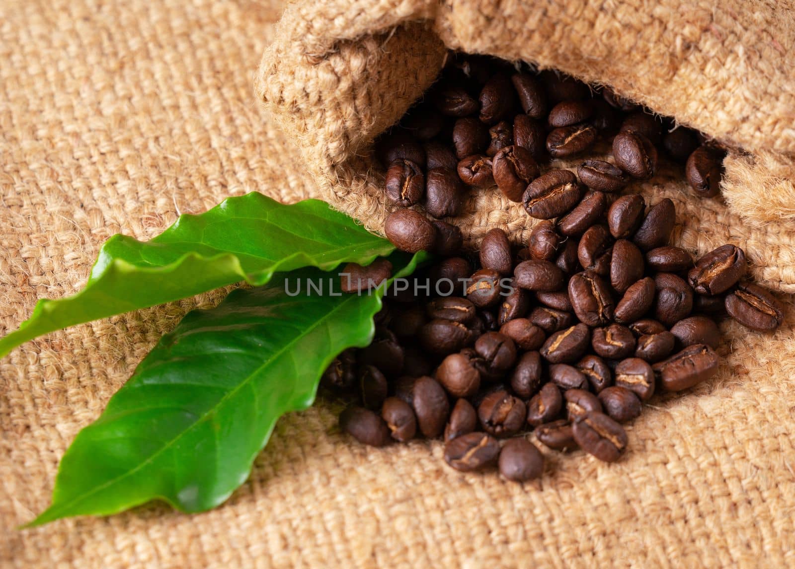 roasted coffee bean on linin sack by anankkml