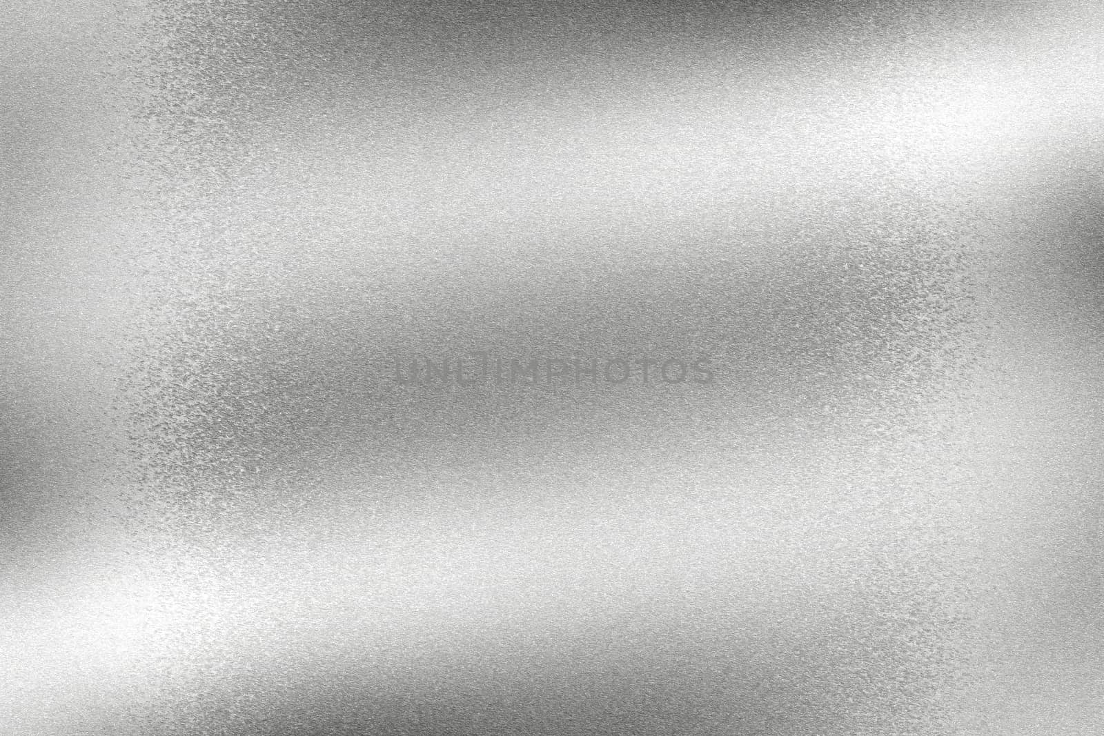 Light shining on wave metal sheet, abstract texture background