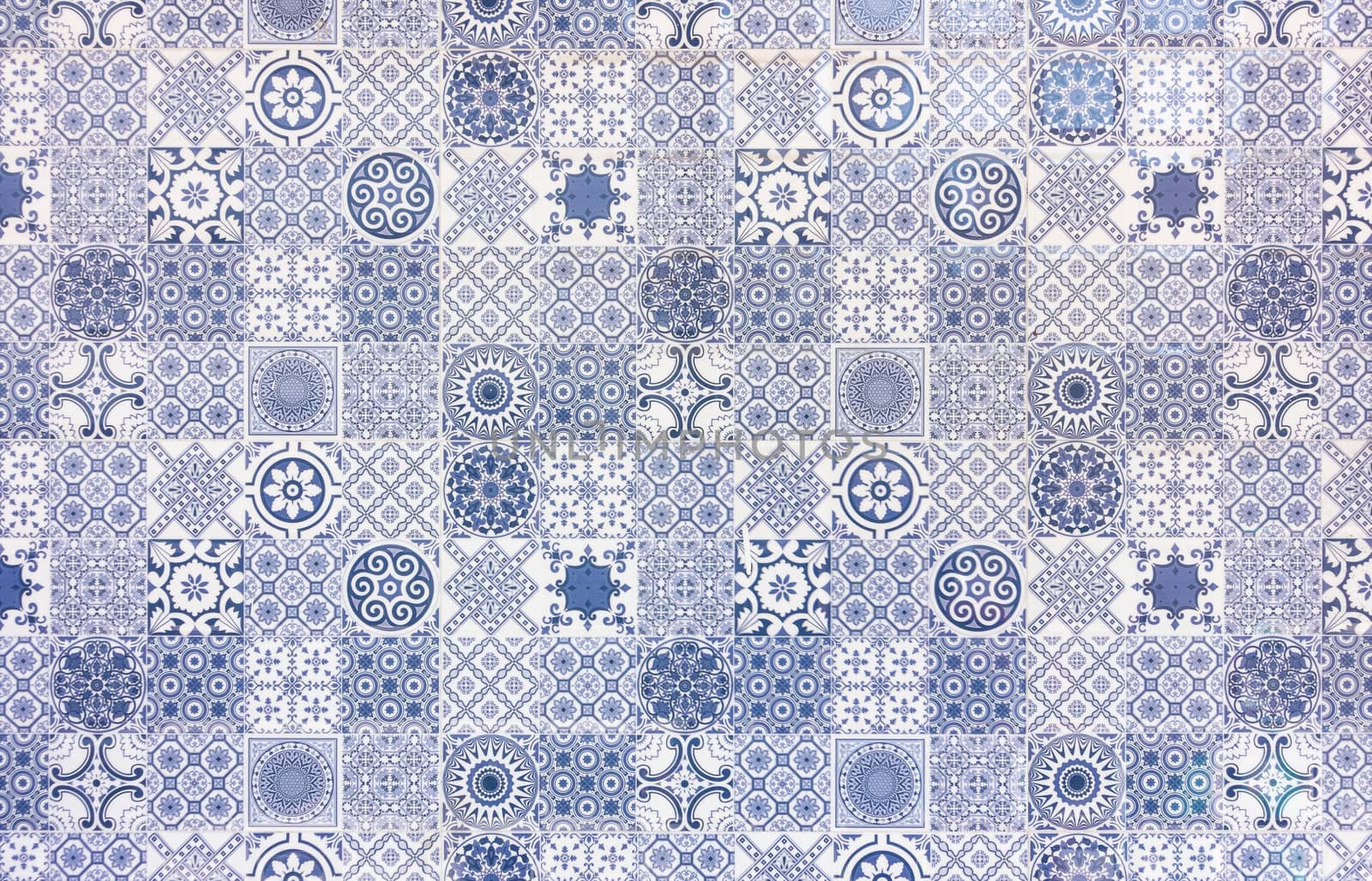 White and blue geometric azulejo tile wall texture or background