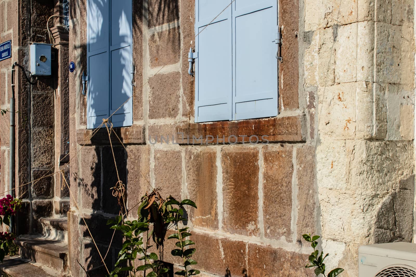 good looking window from an old little house. photo has taken at foca/turkey.