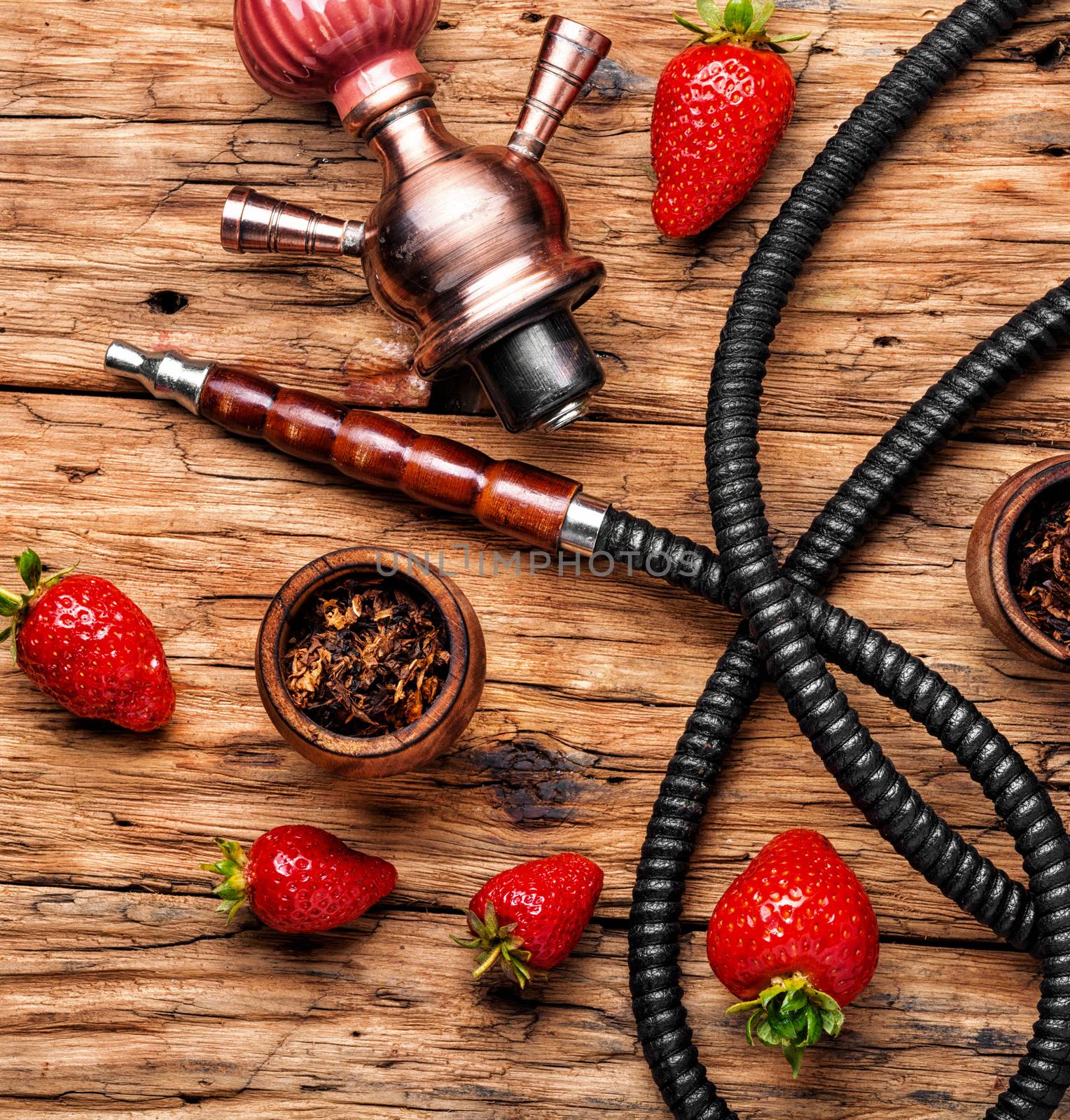 Oriental hookah with strawberry flavor.Turkish shisha with berry tobacco