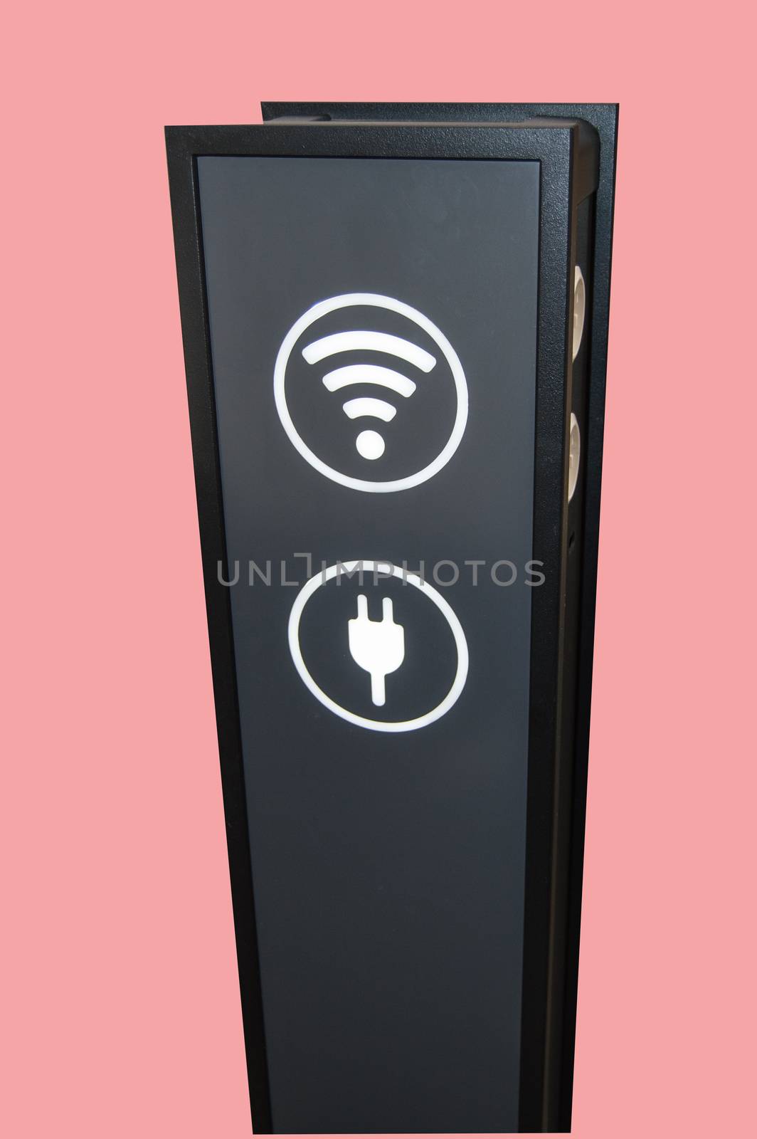 Stand tower for charging mobile phones in shopping Mall, wifi zone sign isolated on pink background by clipping, vertical shot.