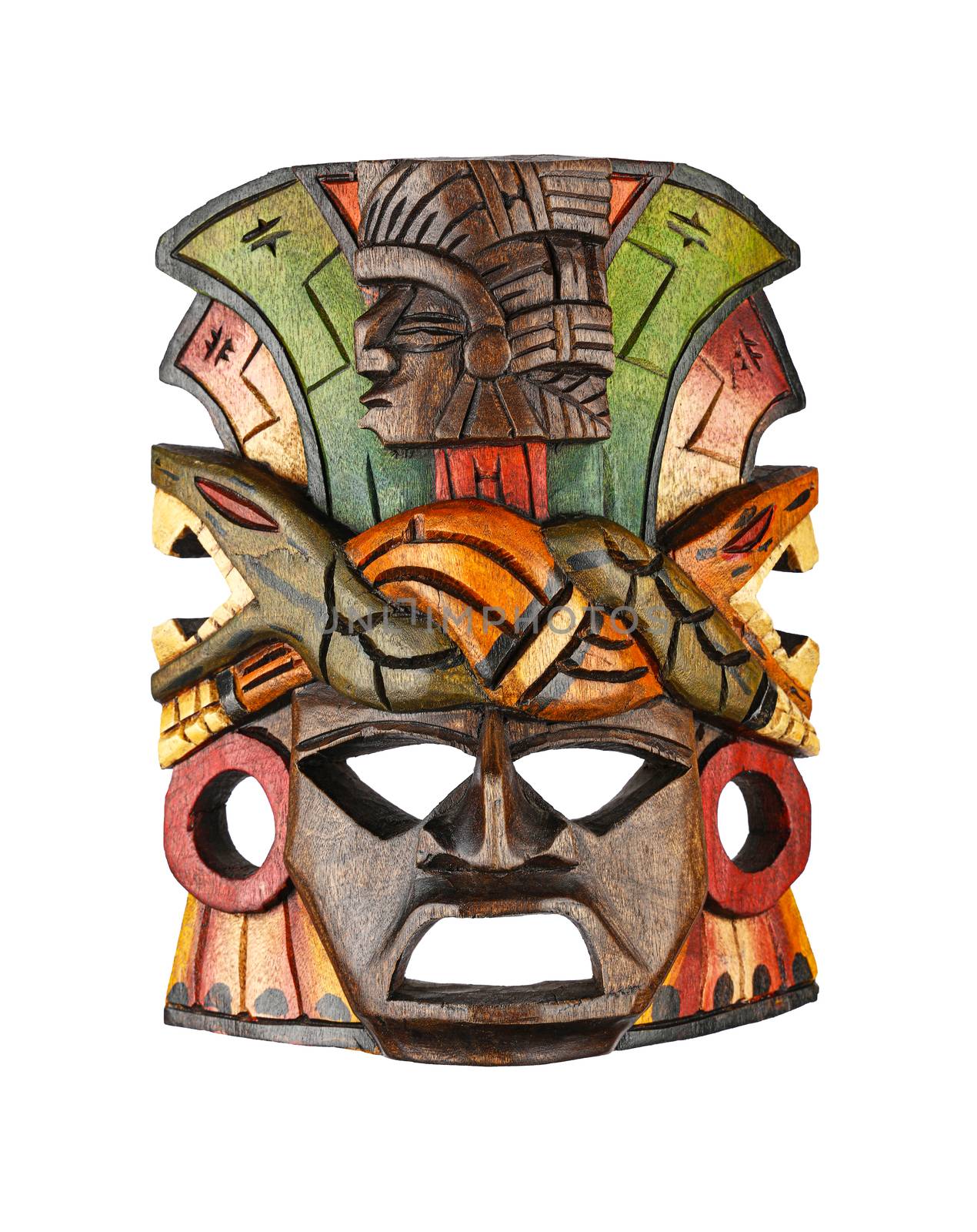 Close up one wooden carved painted traditional Aztec or Mayan Indian ethnic souvenir mask isolated on white background, low angle front view