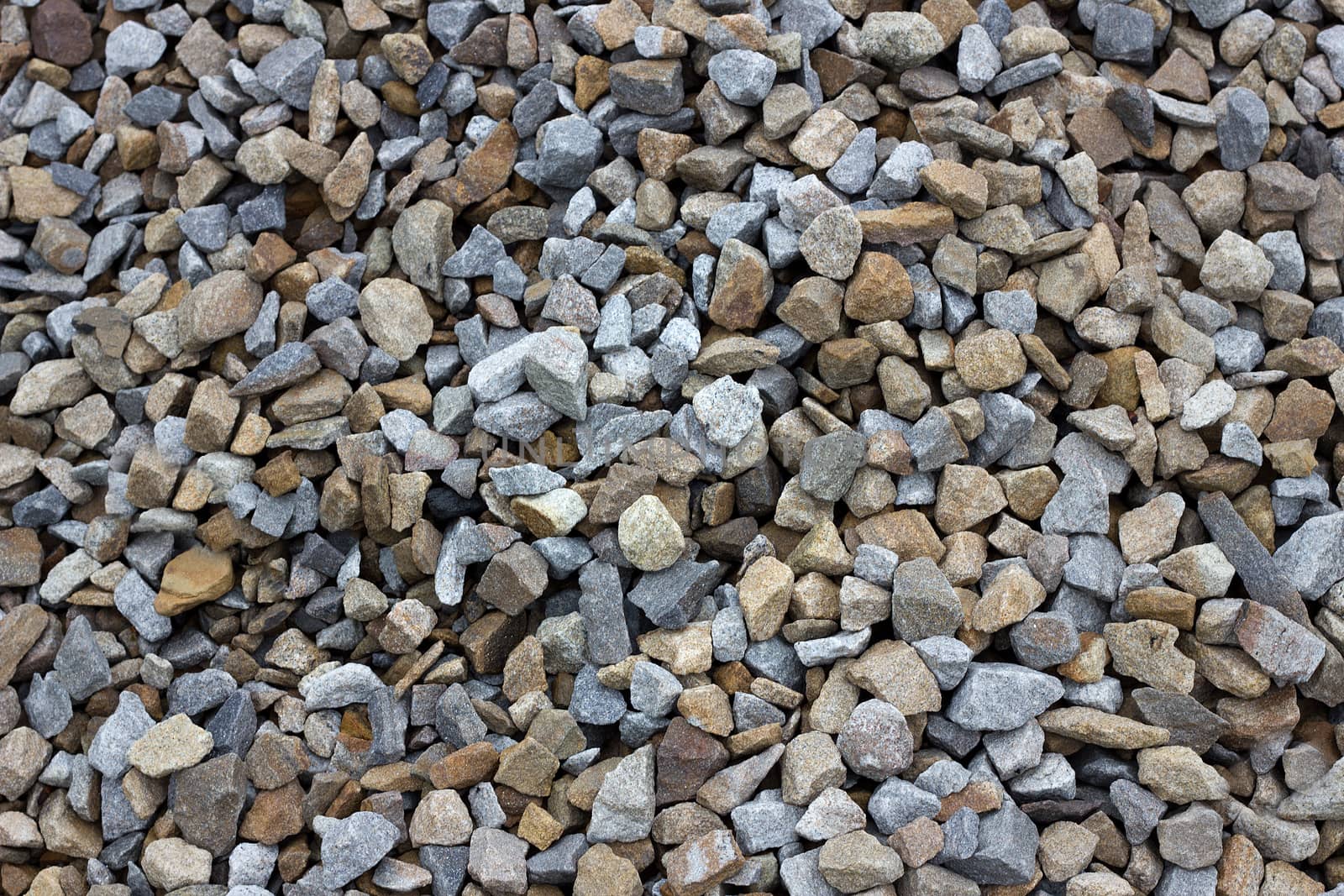 texture of colored crushed stone. Large crushed stone by kasynets_olena