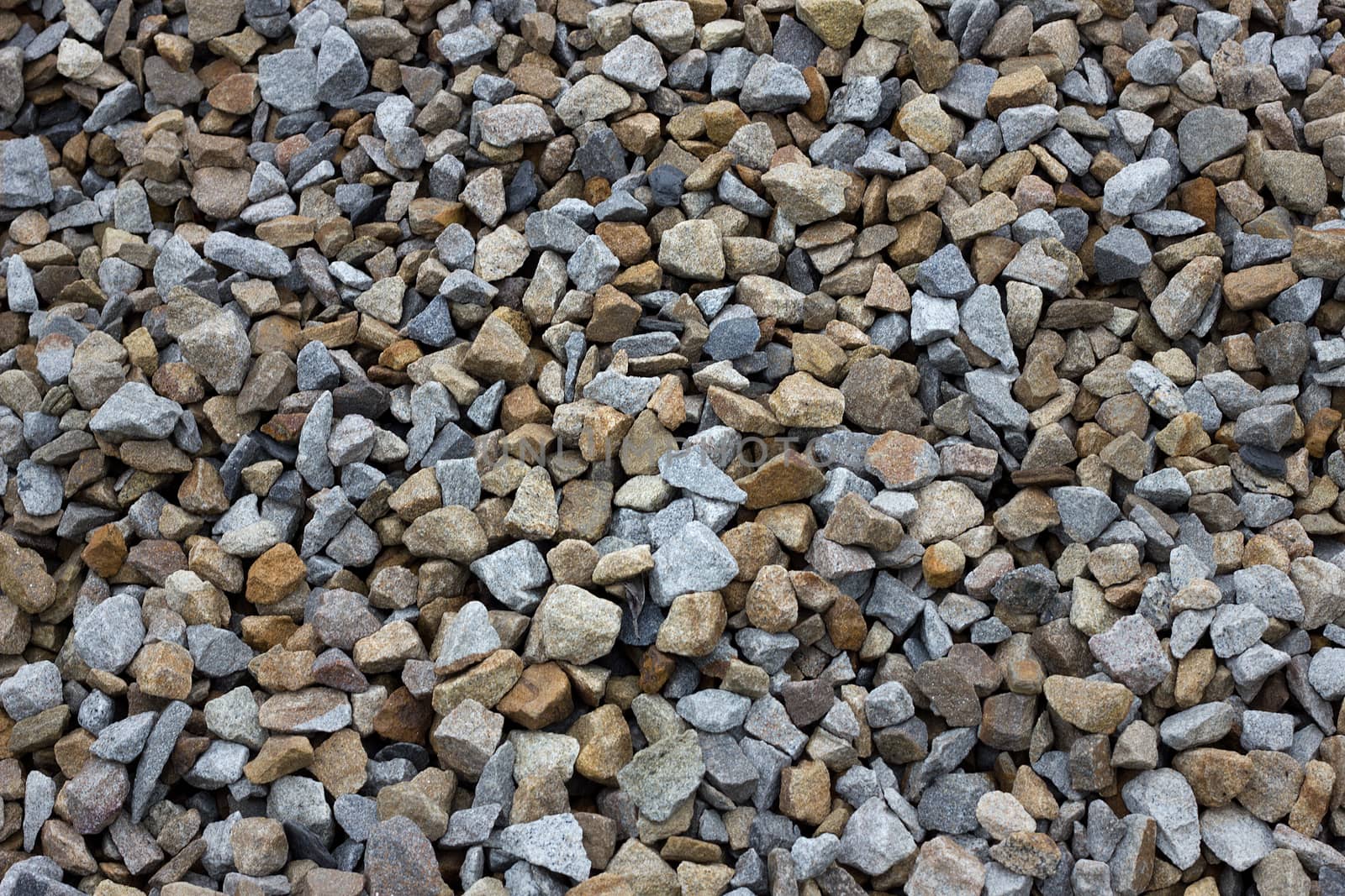texture of colored crushed stone. Large crushed stone by kasynets_olena