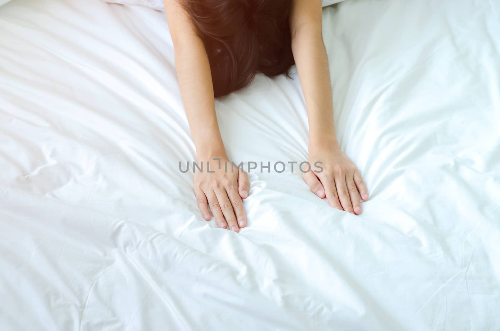 women sit at the edge of the bed.  by enjoyok69