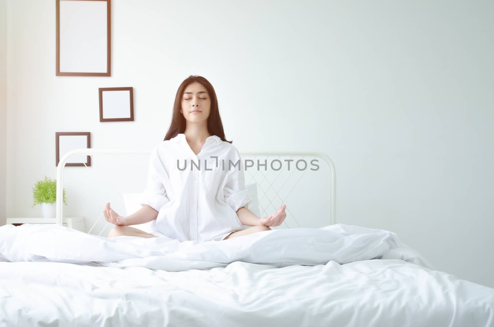 Simple yoga posture on the mattress. by enjoyok69