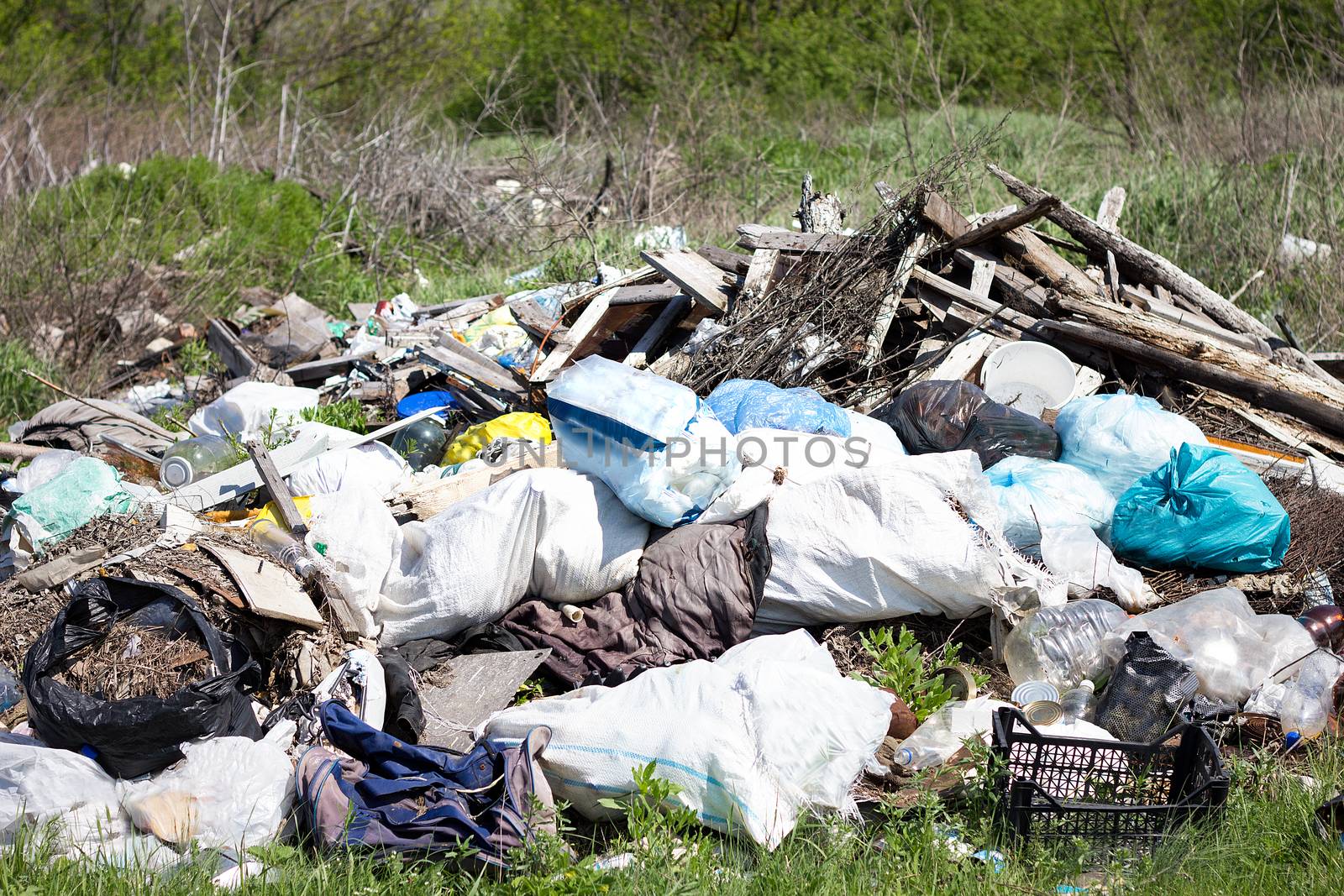 garbage dump in the field. Environmental pollution. Global problems of mankind.