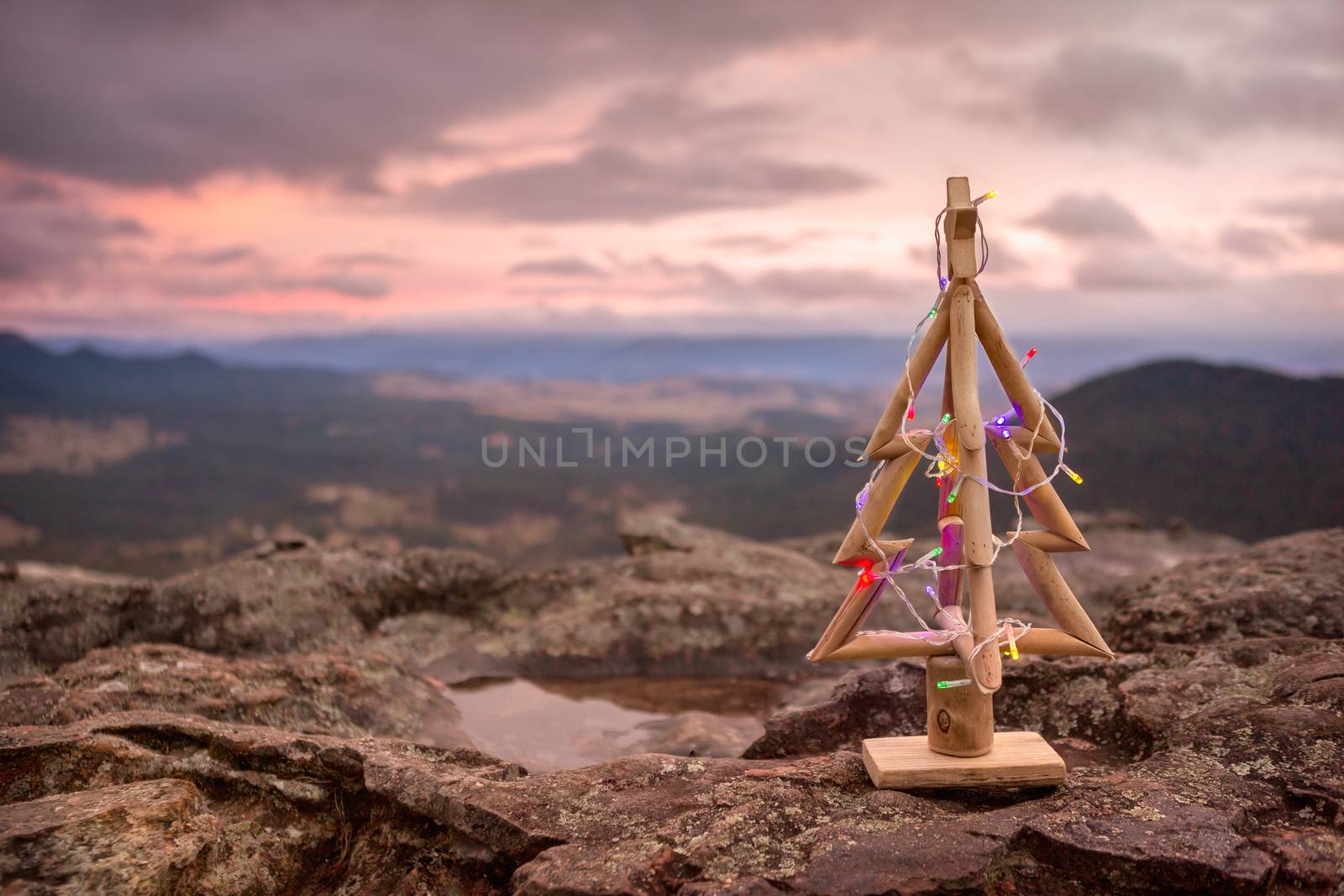 Simple timber Christmas tree with scenic backdrop of Blue Mountains, Australia
