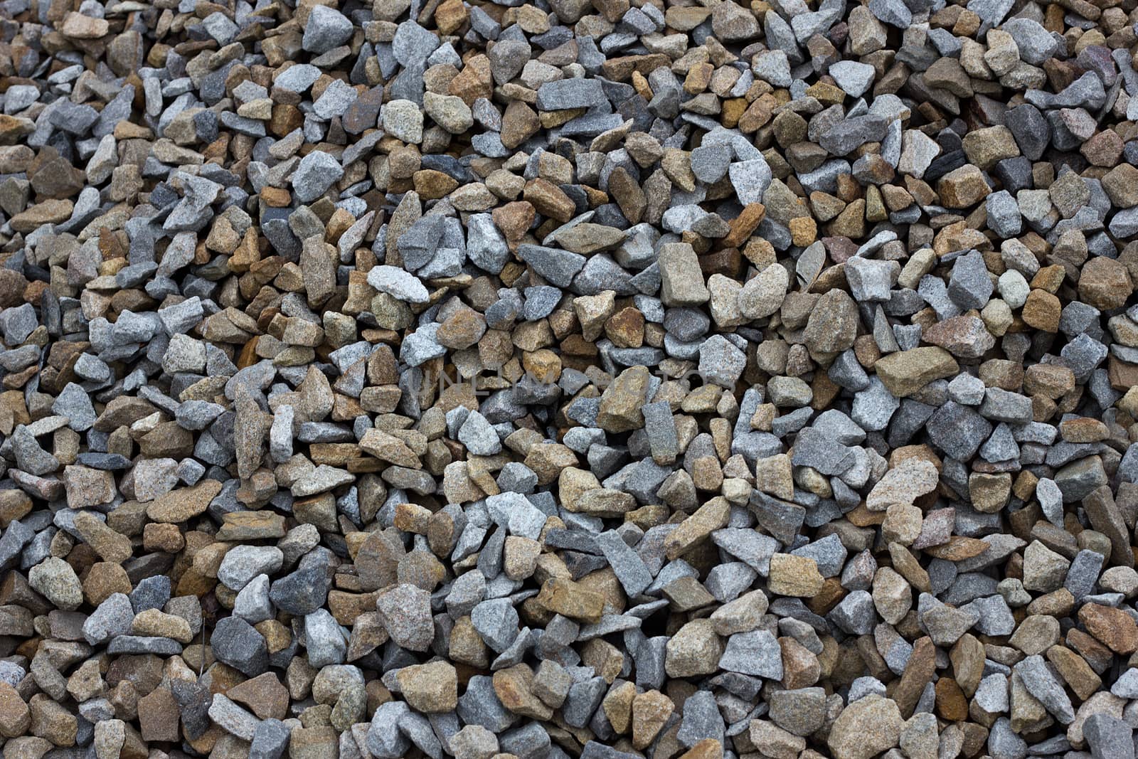 texture of colored crushed stone. Large crushed stone by kasynets_olena