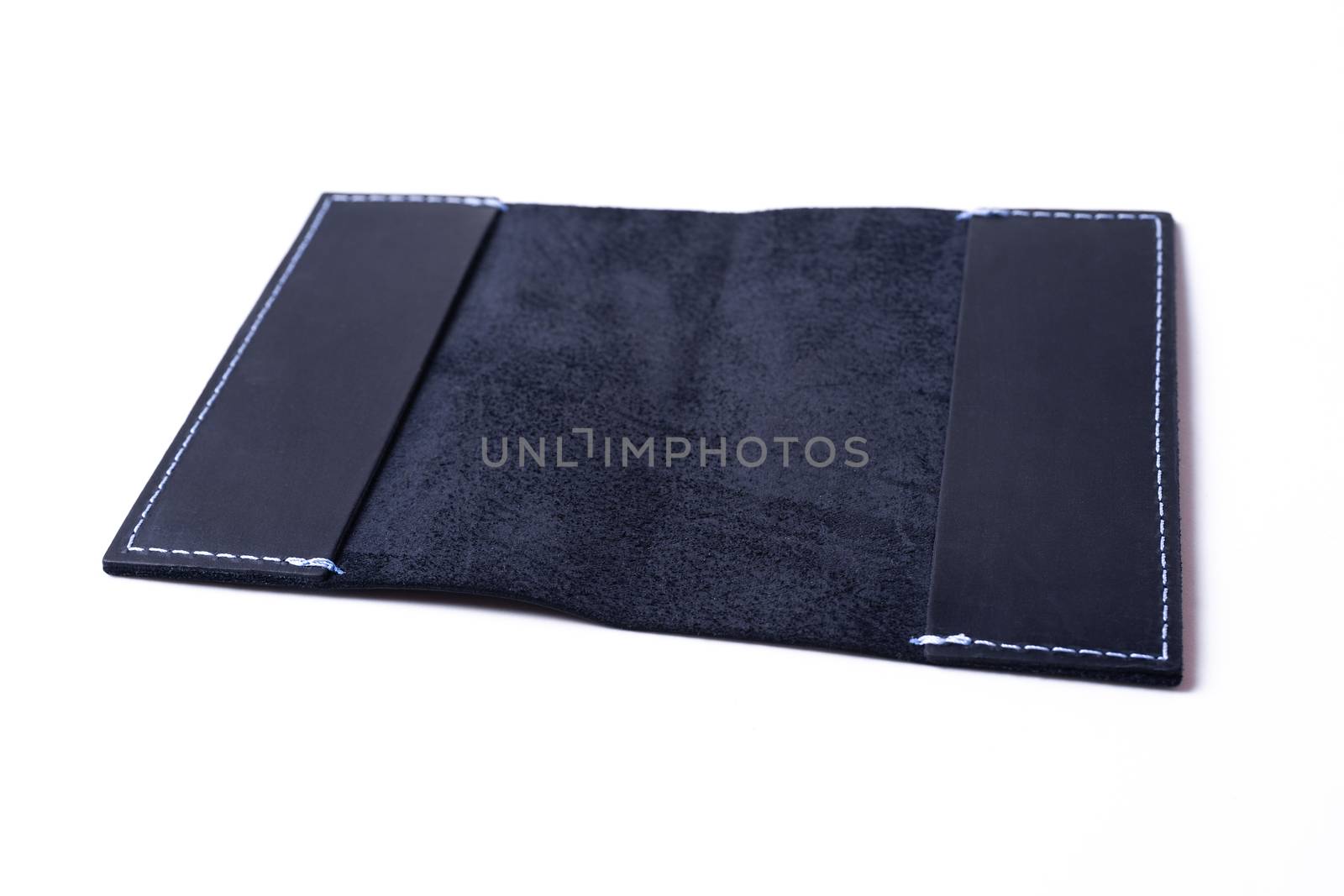 Blue handmade leather passport cover isolated on white backgroun by alexsdriver