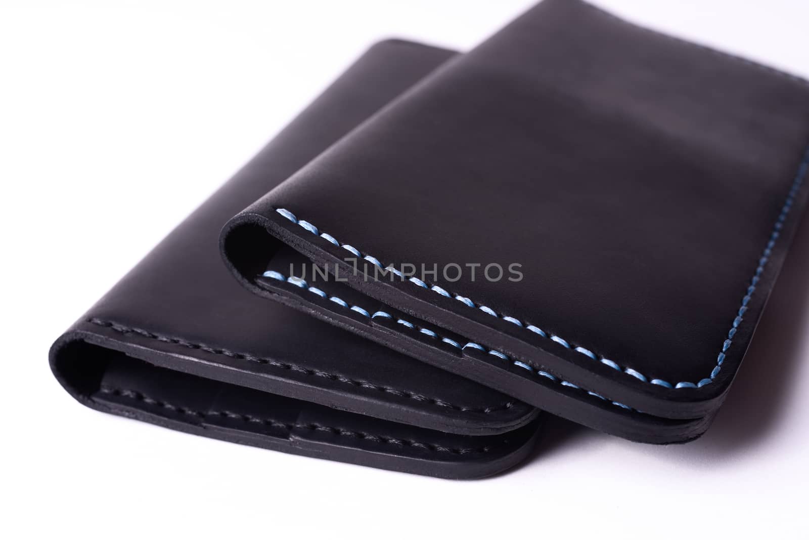 Two handmade leather black purse isolated on white background. S by alexsdriver