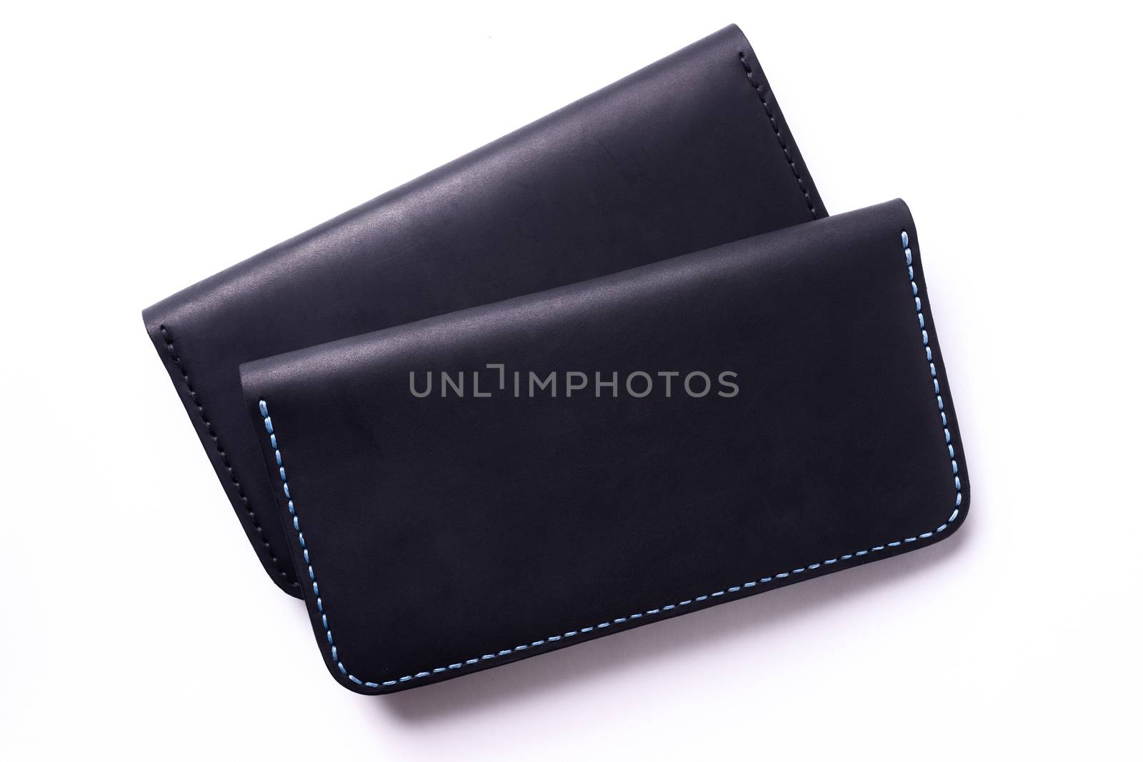 Two handmade leather black purse isolated on white background. S by alexsdriver