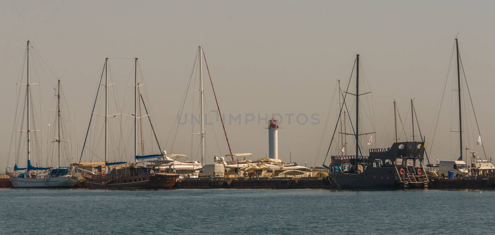 Odessa, Ukraine - 08.28.2018. Yacht club in the port of Odessa, Ukraine. Panoramic view from the sea in a sunny summer day.