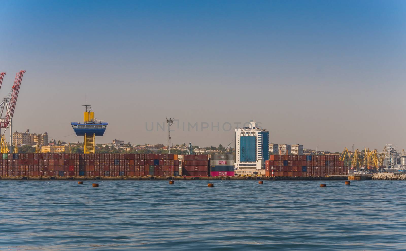 Odessa, Ukraine - 08.28.2018. Panoramic view from the sea of cargo port and container terminal in Odessa, Ukraine