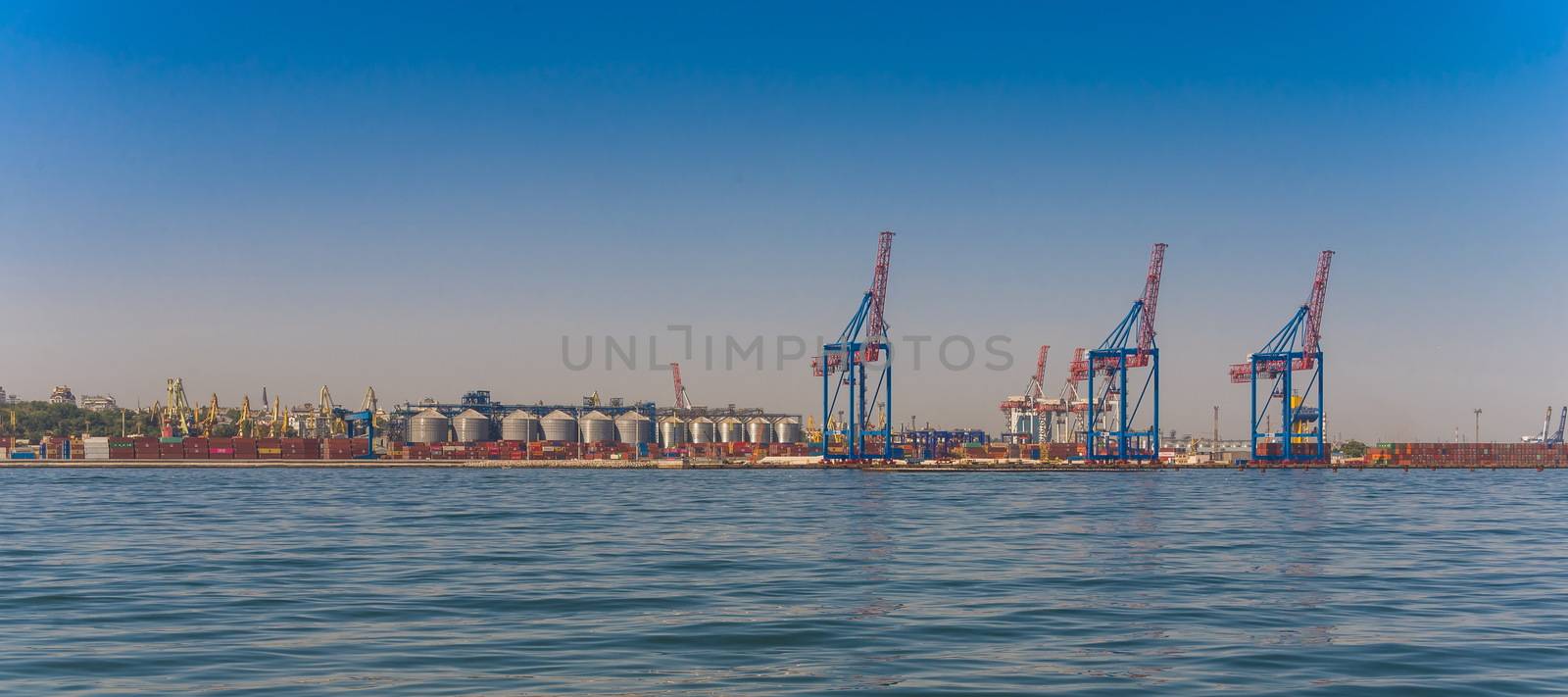 Odessa, Ukraine - 08.28.2018. Panoramic view from the sea of cargo port and container terminal in Odessa, Ukraine