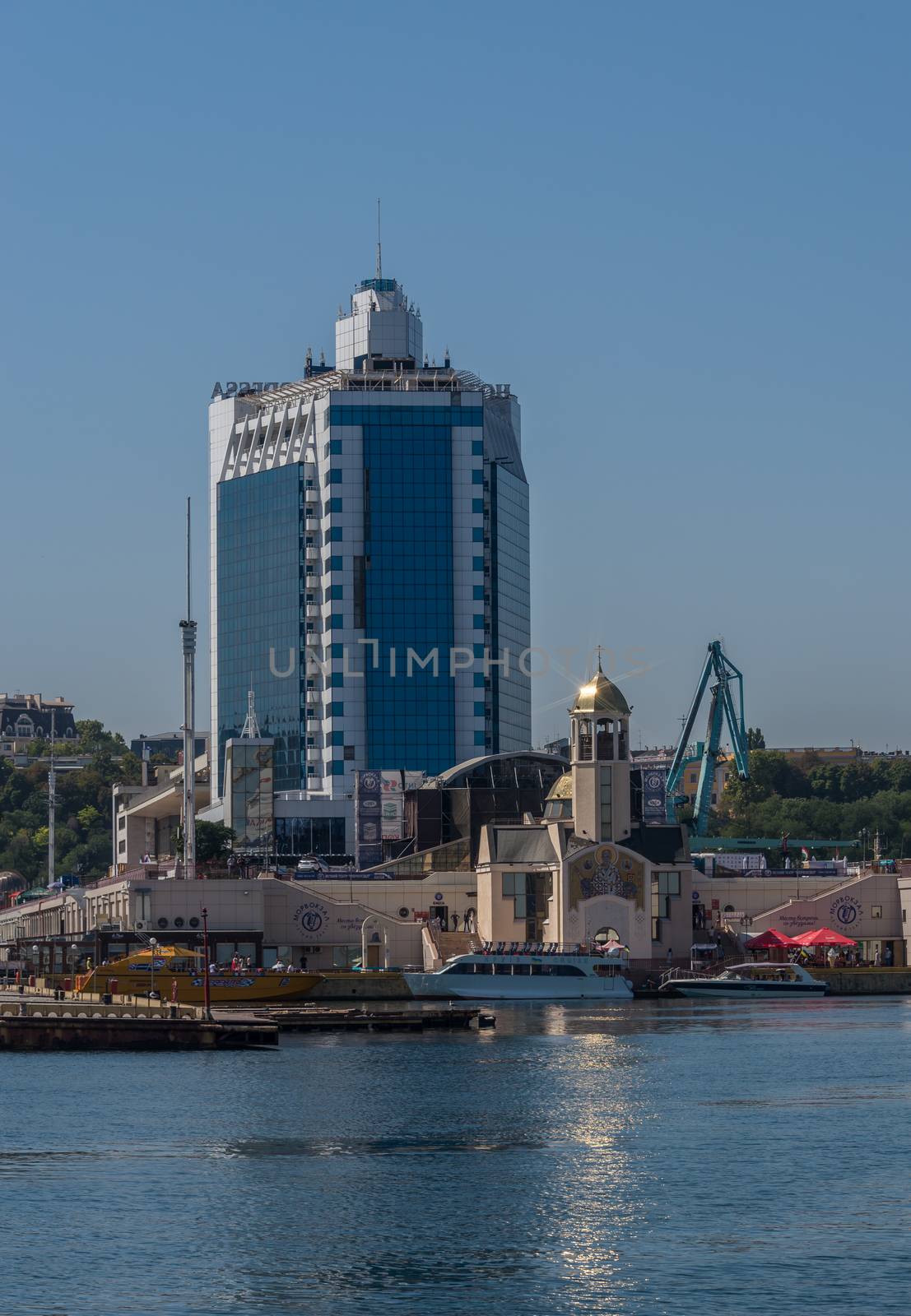 Odessa, Ukraine - 08.28.2018. Yacht club in the port of Odessa, Ukraine. Panoramic view from the sea in a sunny summer day.