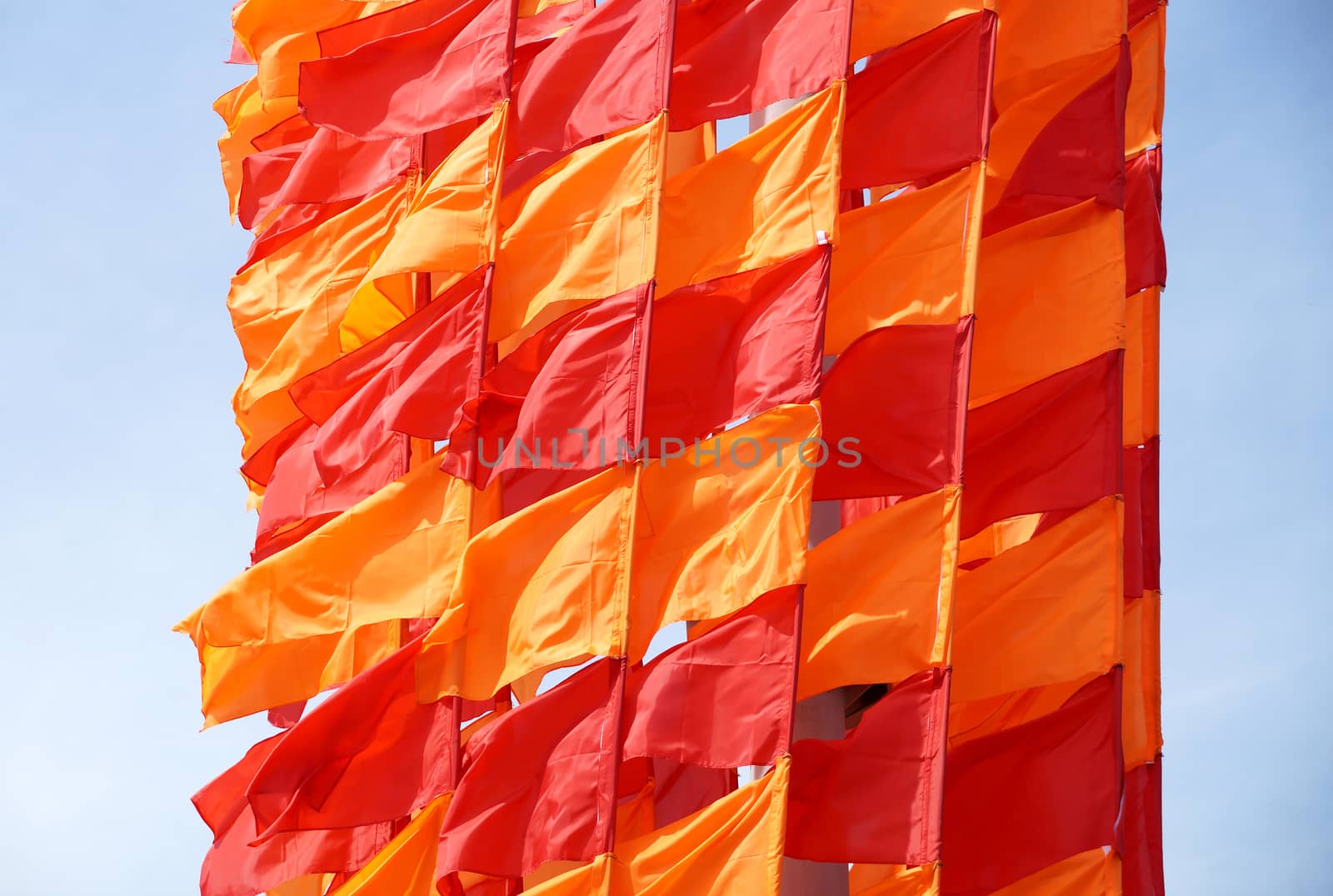 Festive flags of red and orange color by Vadimdem