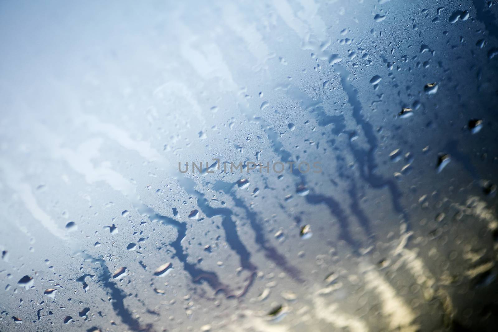 Water drops colorful macro droplets on window amazing background fine art in high quality products fifty megapixels