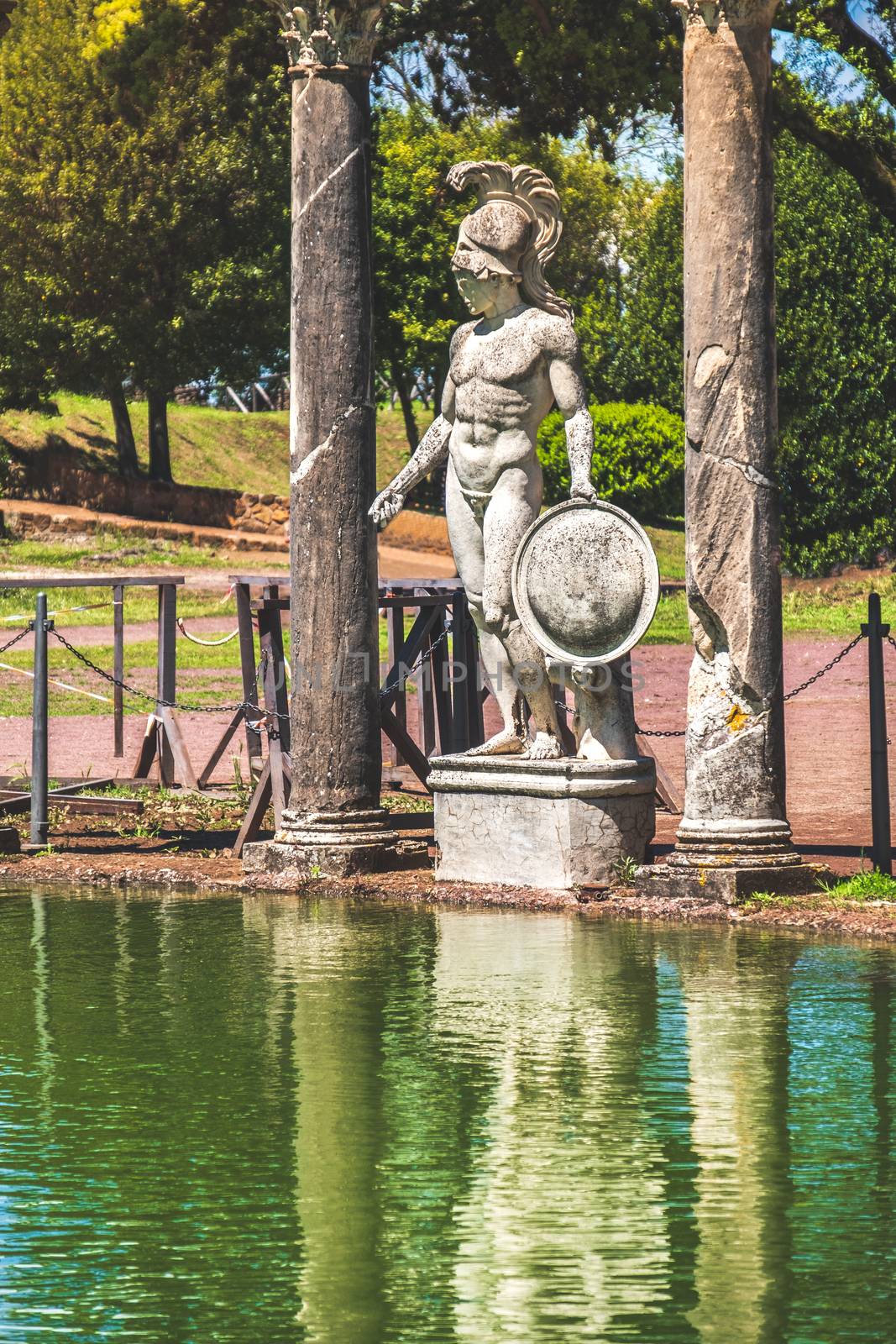 Tivoli - Villa Adriana Canopo - Lazio - Italy statue of roman hero god with helmet and shield .
