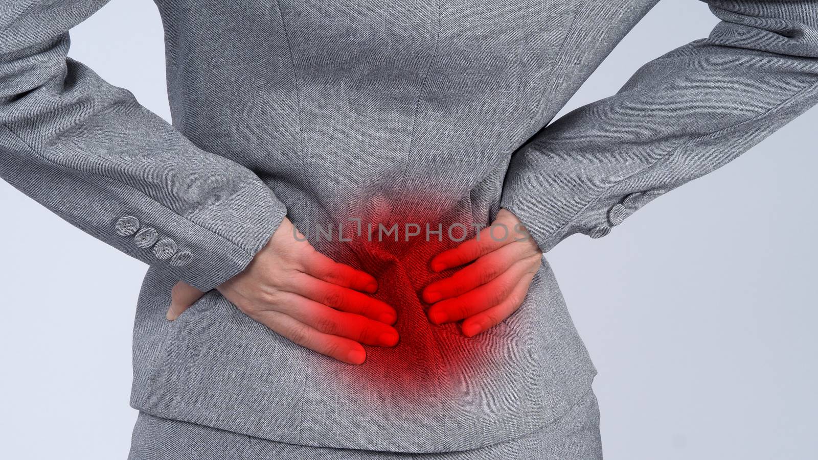 Business woman muscle suffering or painful from myositis or office syndrome or working which represent pain point by red gradient dot color and grey color suit and white background