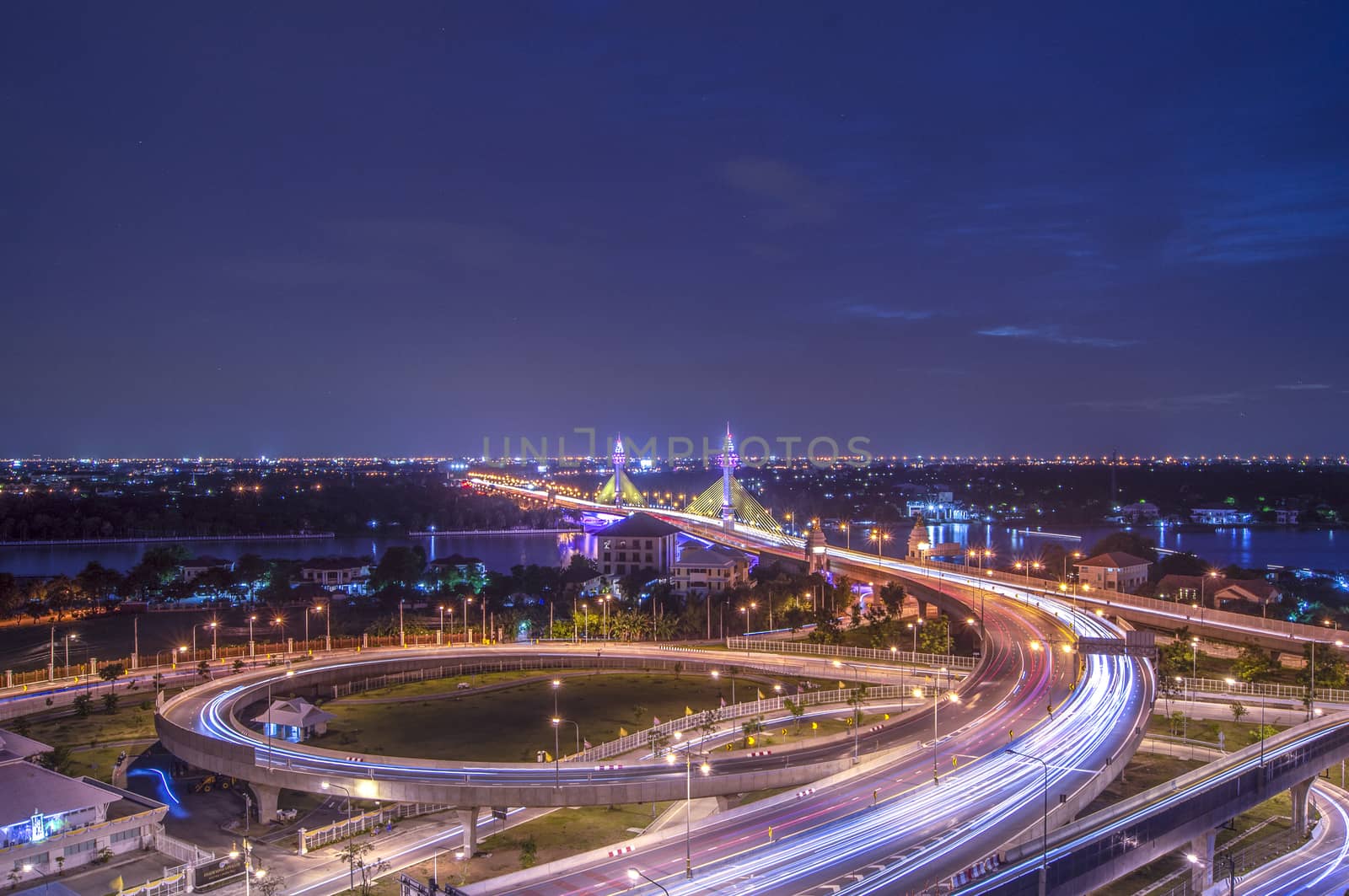 The opening of the light to decorate the bridge across the Chao Phraya River in Thailand, LED lighted bridge, traffic on the bridge over the river