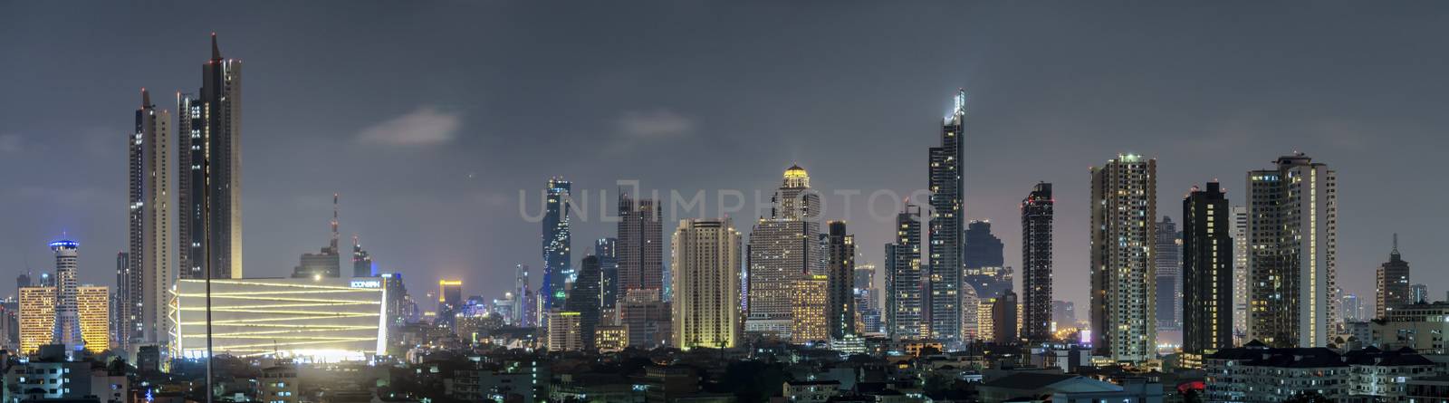 High-rise building in the capital city of Thailand Bangkok office area Night light from the building	

