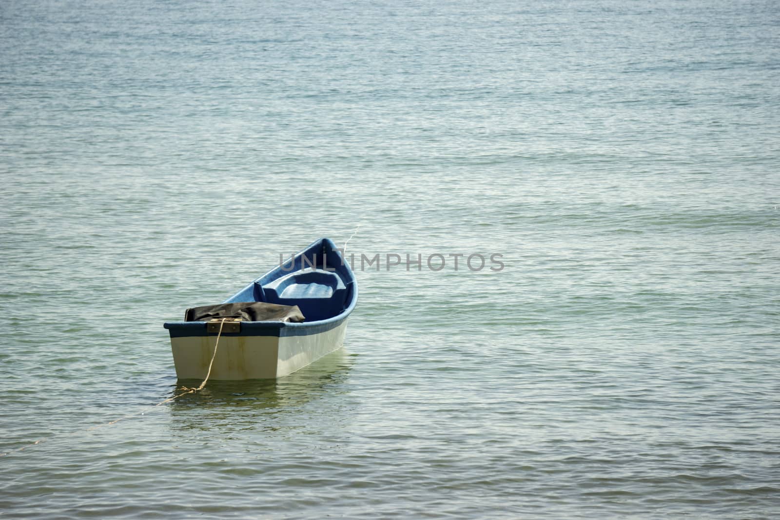 Small boats park by the sea. Small boats near the beach. Sandy beach at Sairee Beach, Chumphon Province