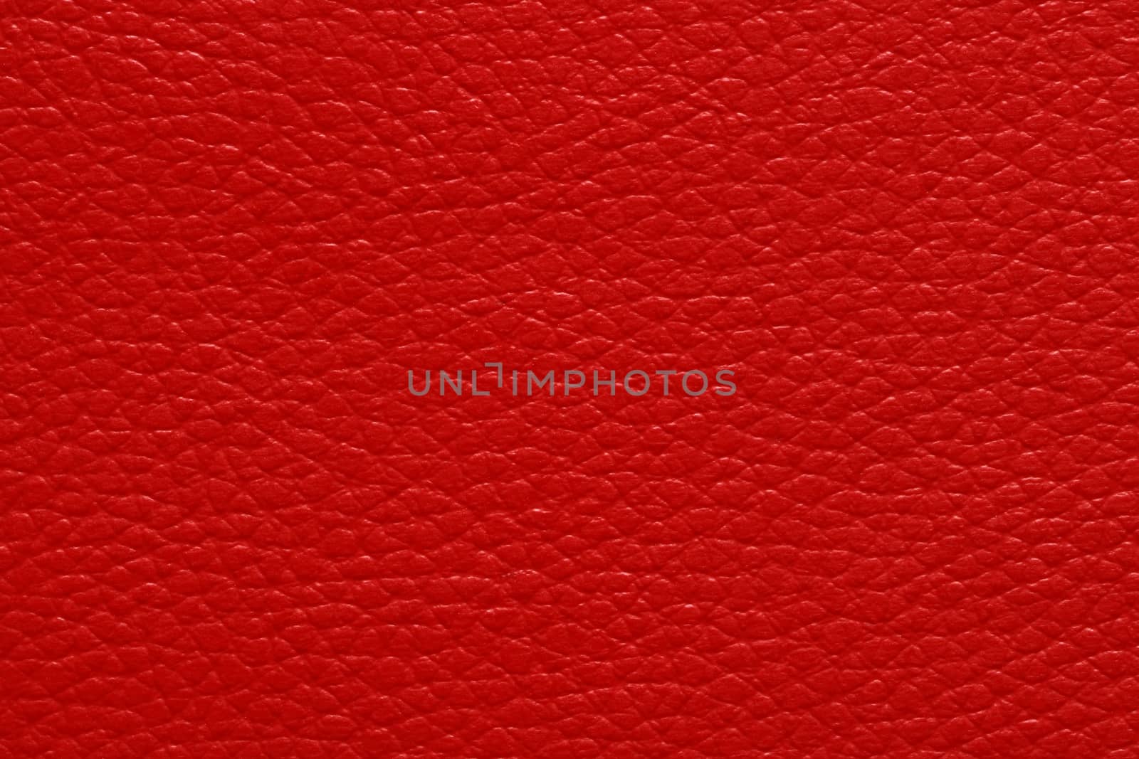 Glowing red leather sheet, abstract pattern texture background