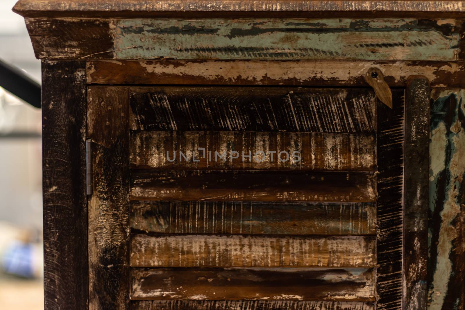 a good looking old vintage wooden cabinet. photo has taken from a furniture shop.