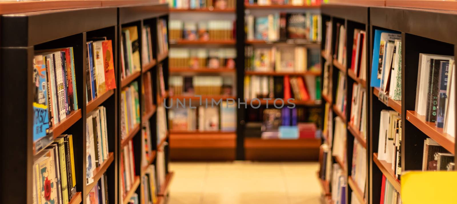 various books on shelves at local book store. photo has taken at izmir/turkey.