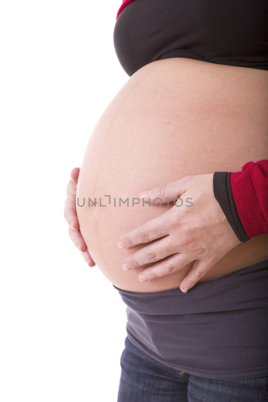 Closeup of pregnant woman at white background