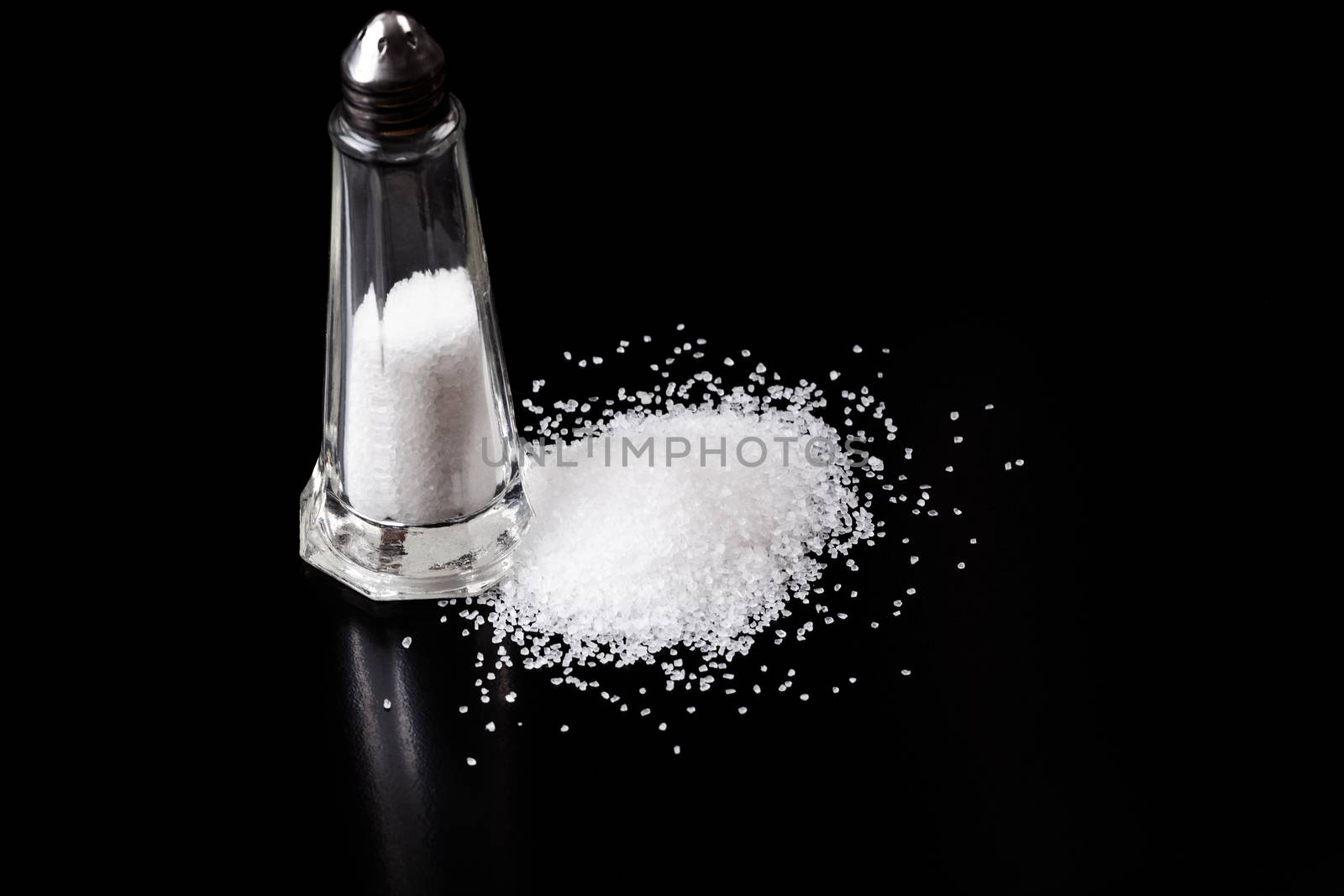 Salt Shaker With silver top and white Sea Salt pile