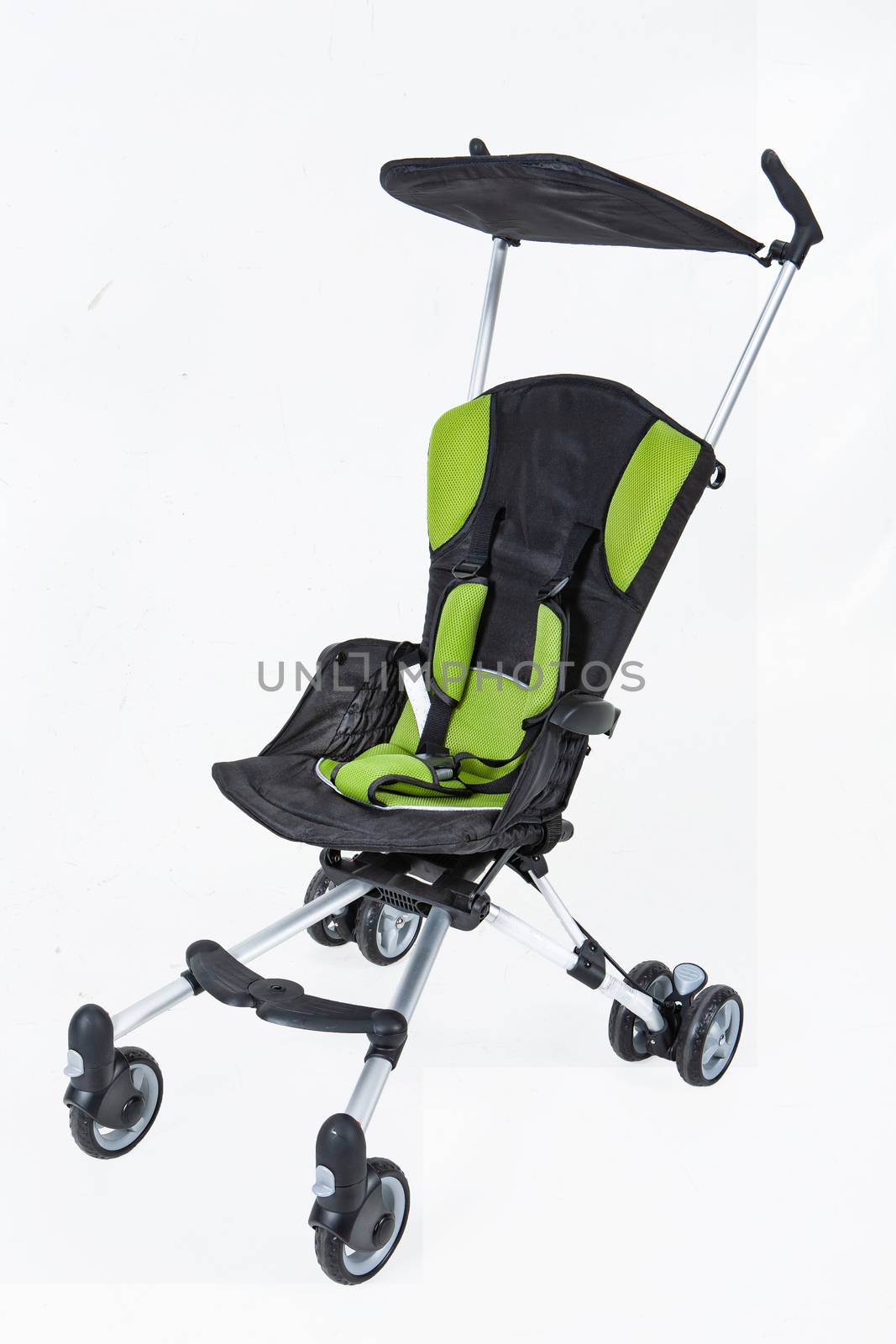 Baby carriage on an isolated studio background