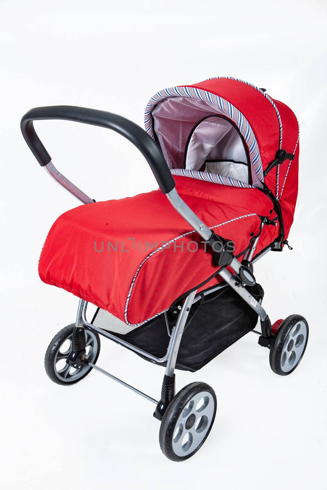 Baby carriage on an isolated studio background