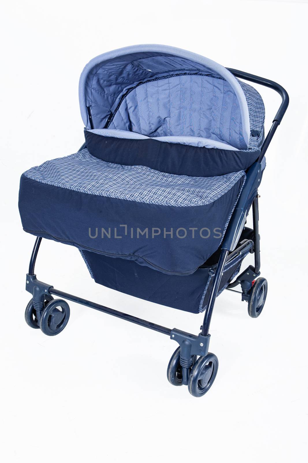 Baby carriage on an isolated studio background