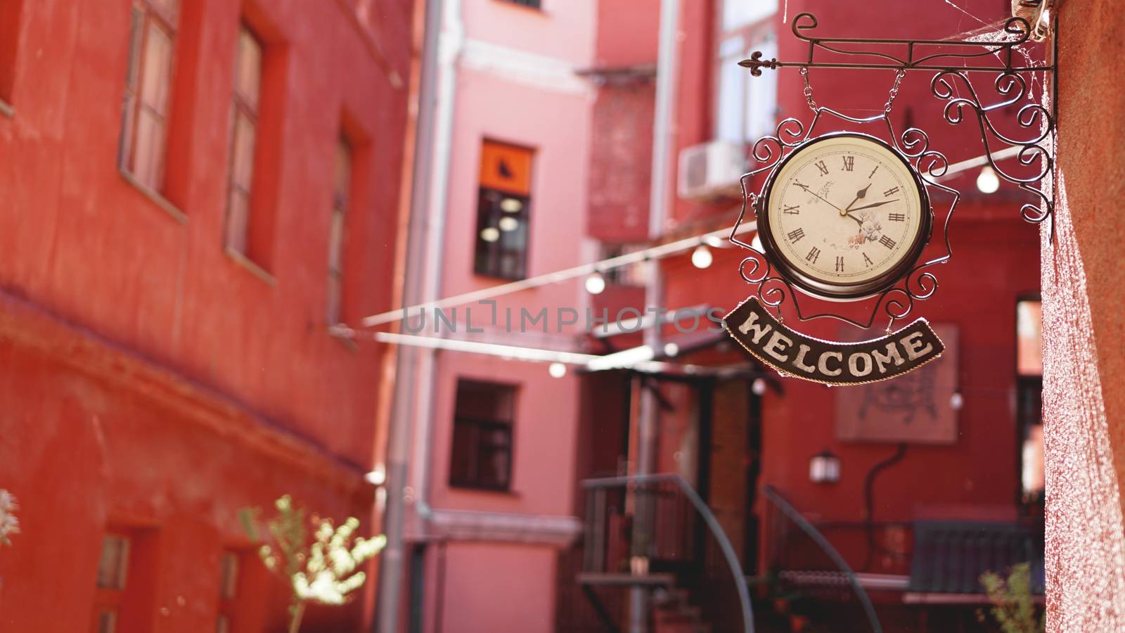 Clock with label Welcome by natali_brill