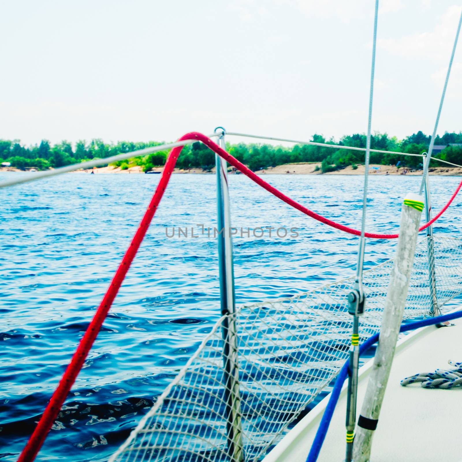 river or lake summer Sunny day, view from the yacht