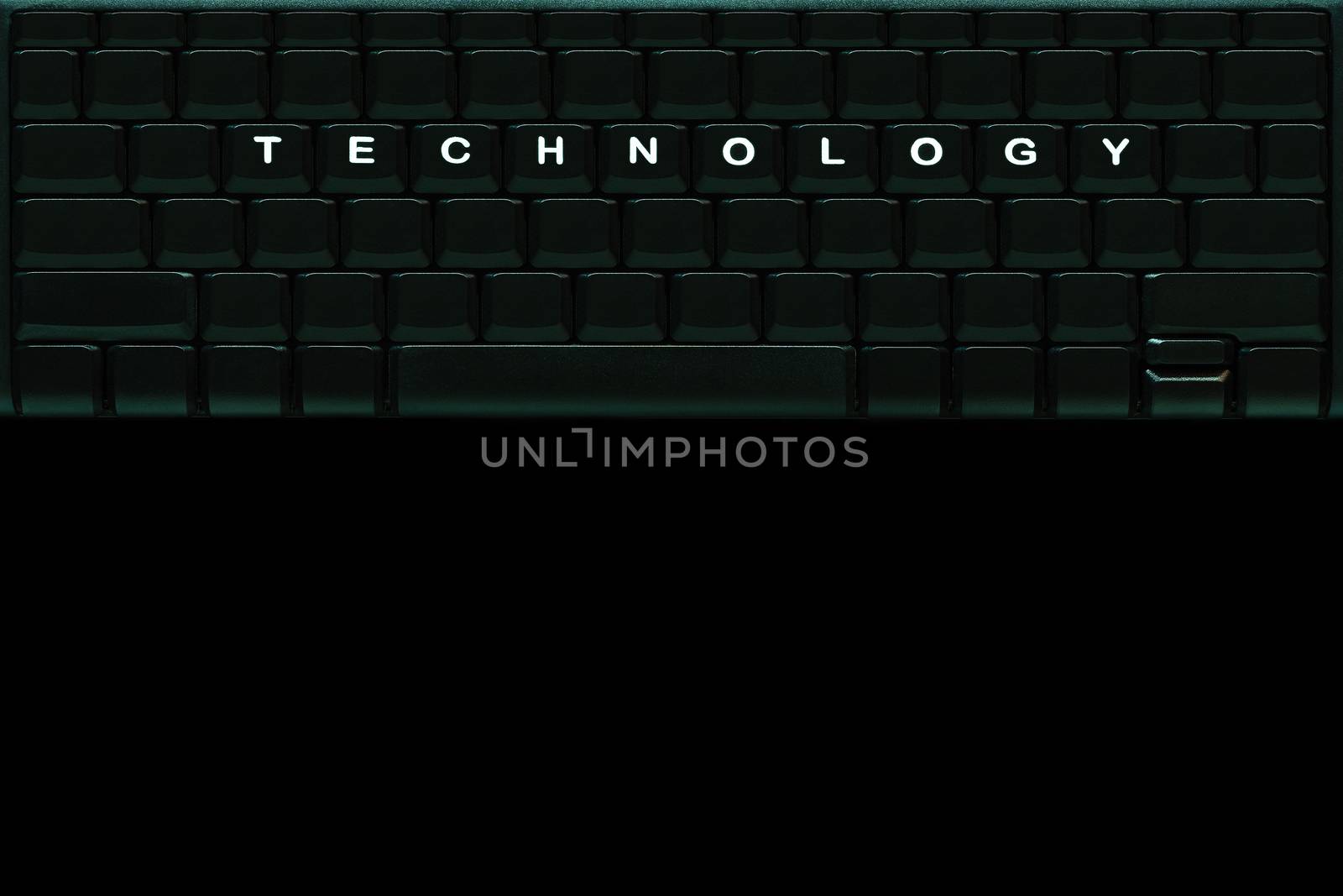 The word “ TECHNOLOGY " on the blank computer keyboard button  by SaitanSainam