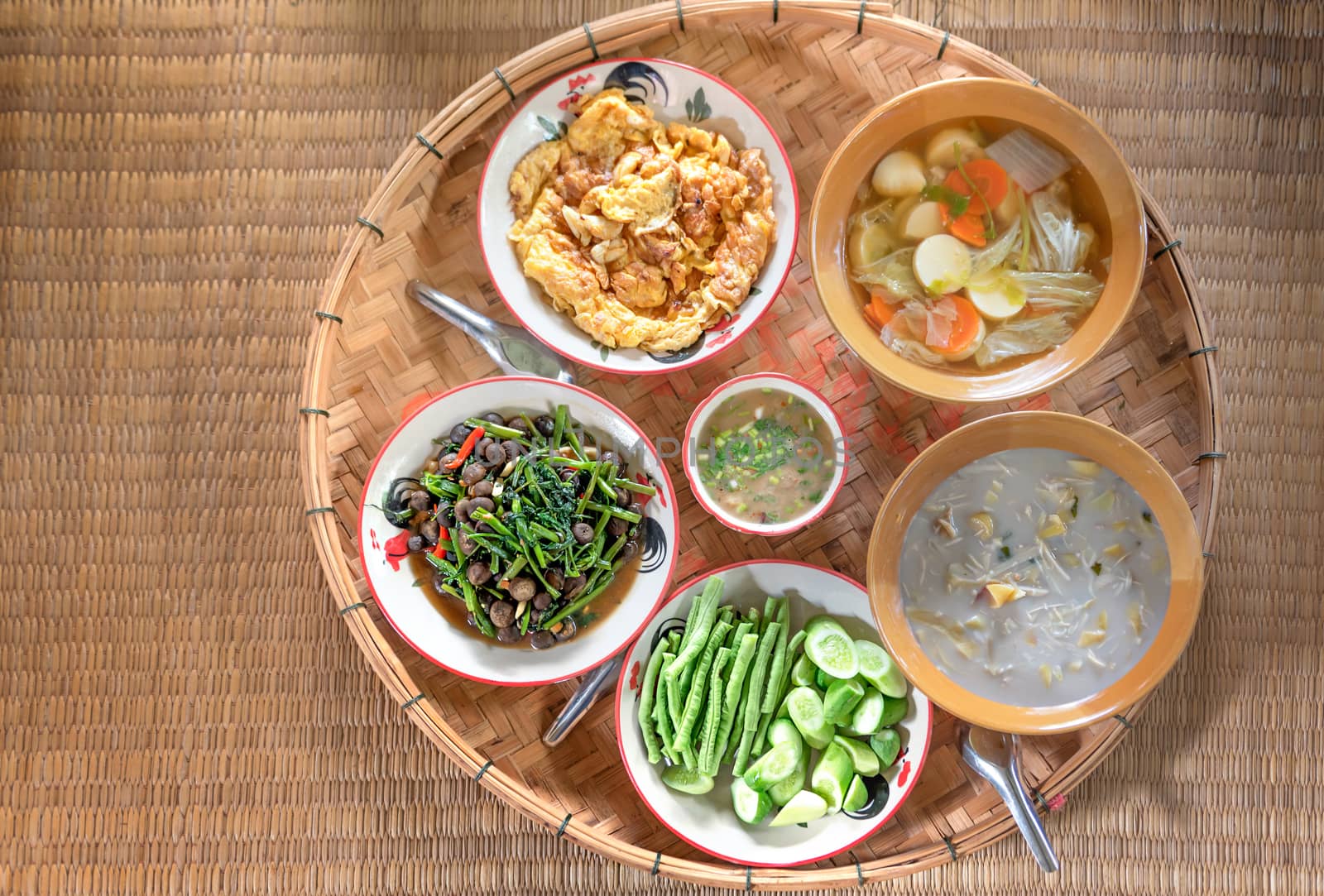 Top view of Thai style food  over bamboo tray