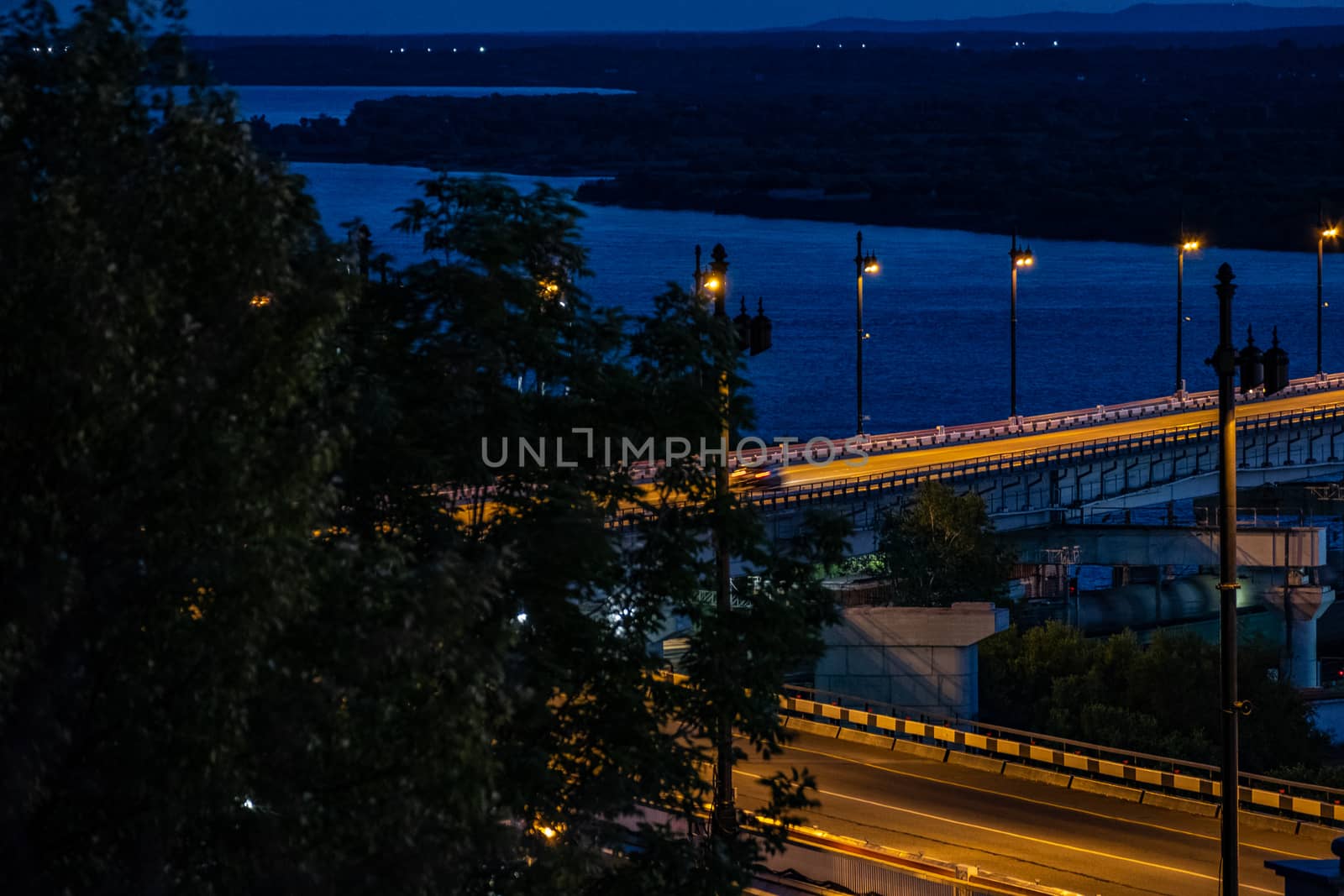 Bridge over the Amur river in Khabarovsk, Russia. Night photography. by rdv27