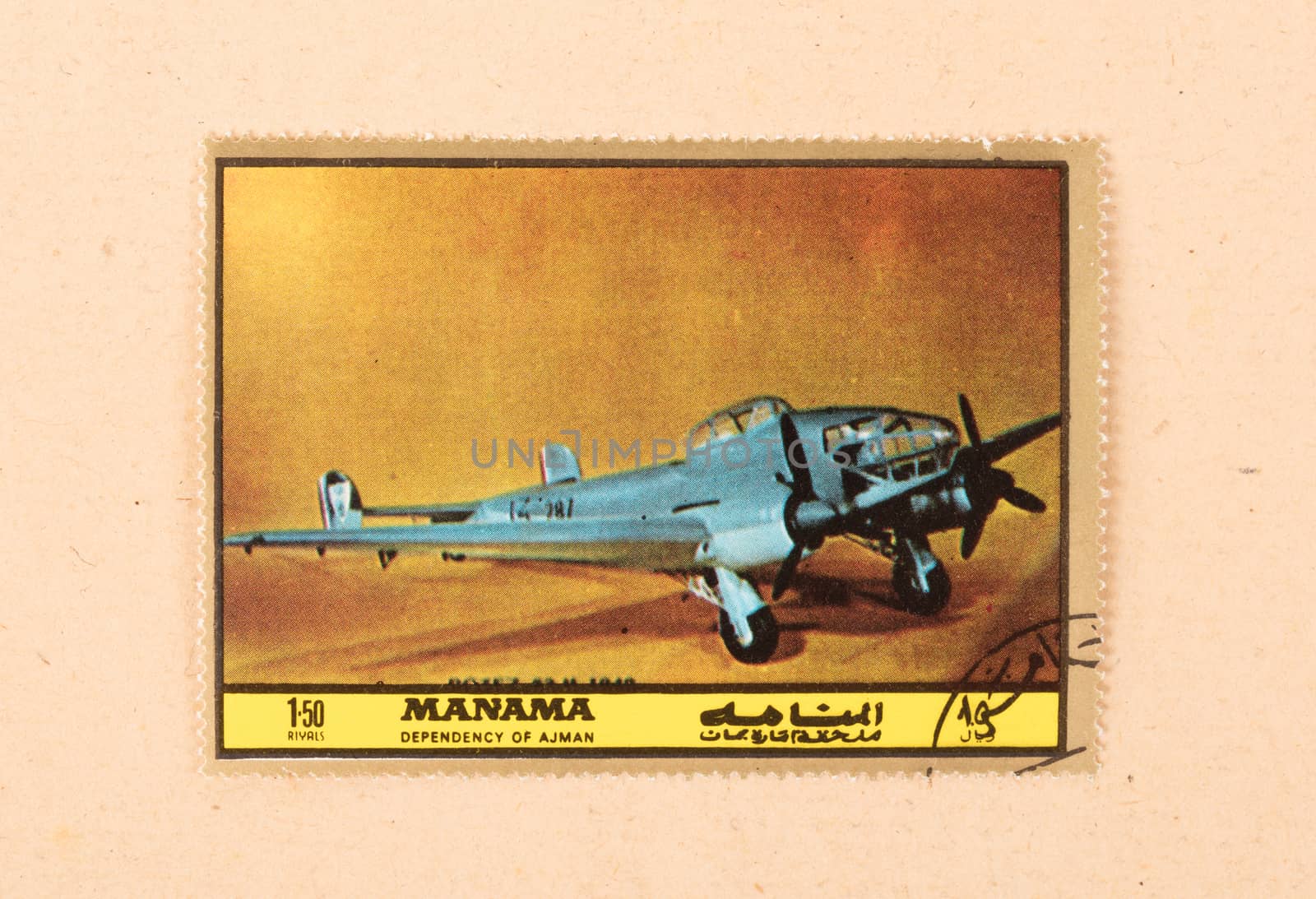 UNITED ARAB EMIRATES - CIRCA 1980: A stamp printed in the UAE shows an old airplane, circa 1980