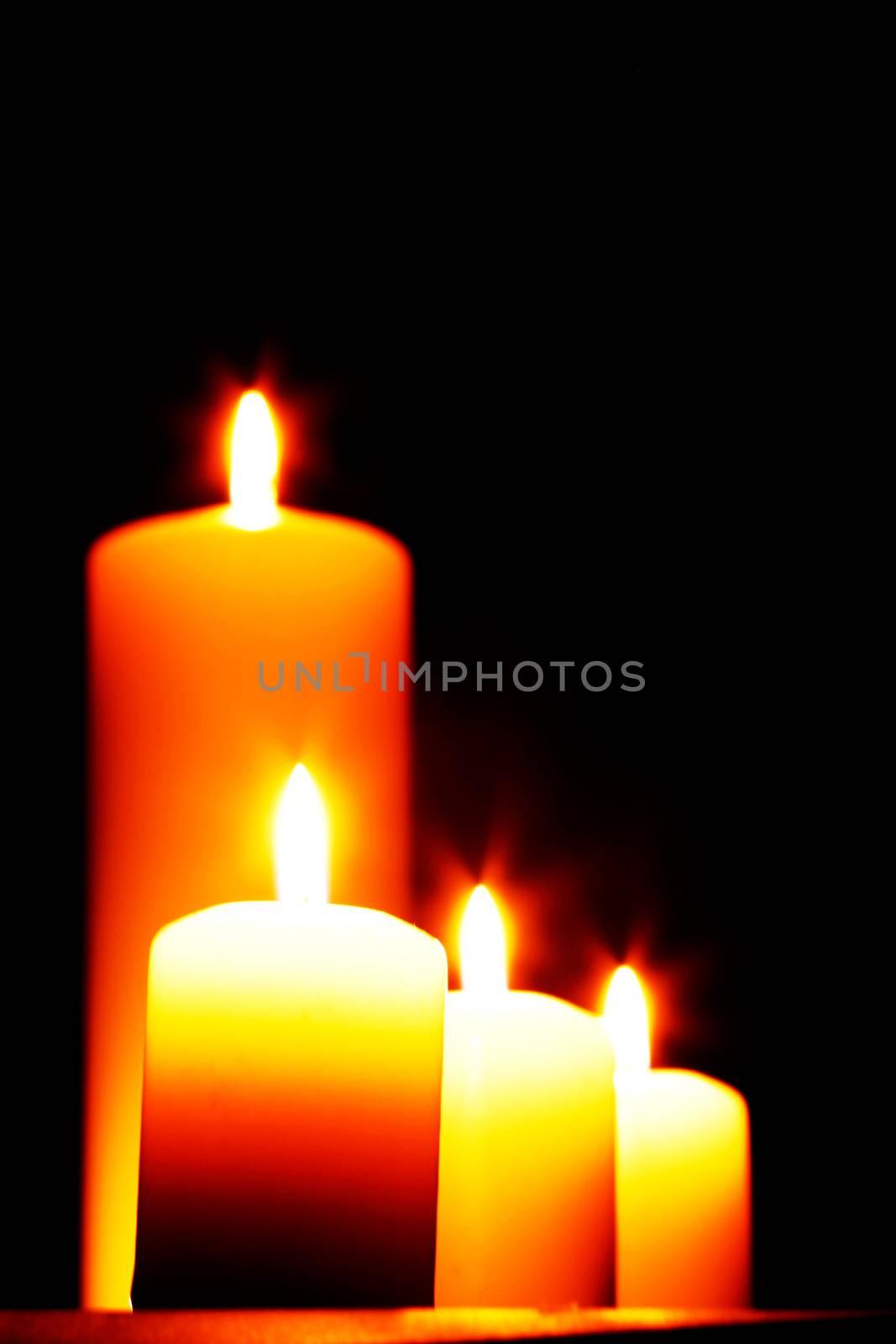 Burning Candles isolated on black background