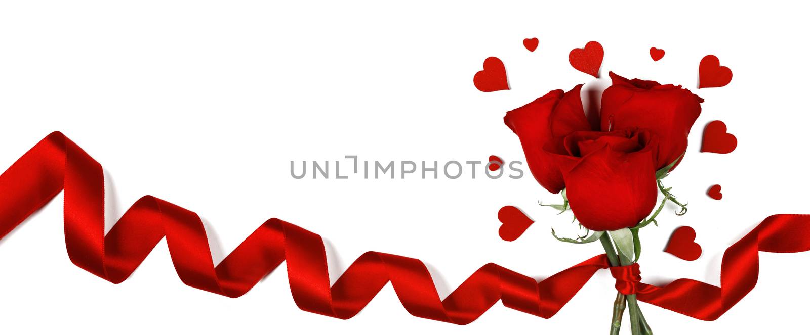Red roses with red ribbon and hearts isolated on white background Valentines day concept