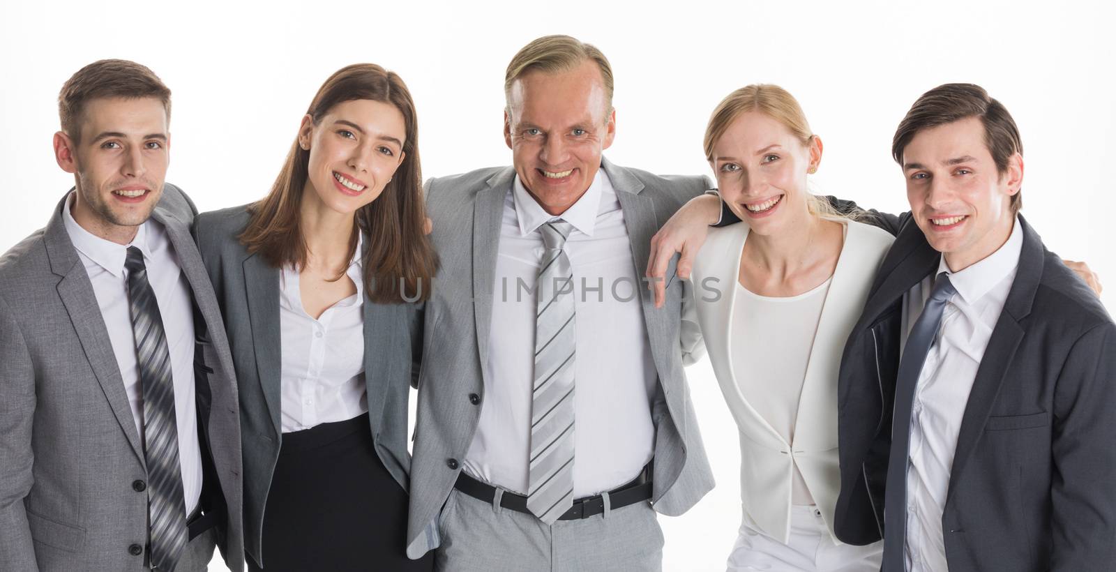 Group portrait of business people embracing studio isolated on white background