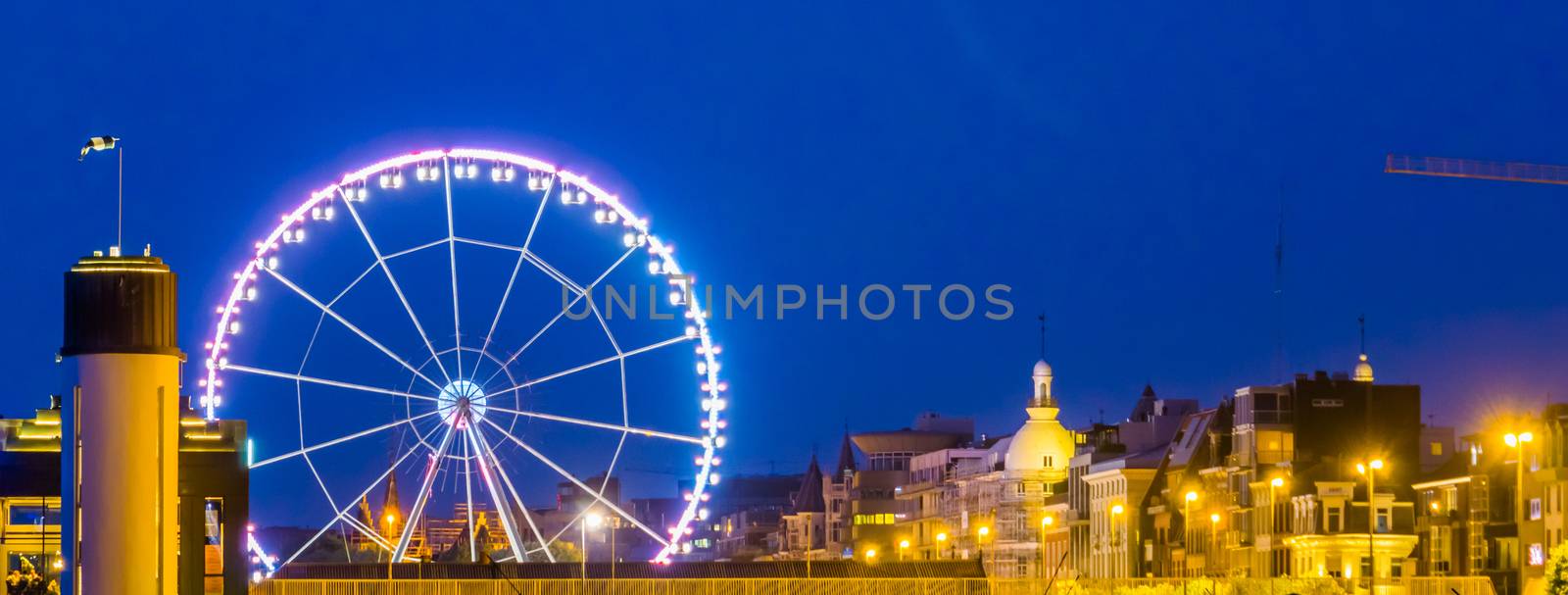 skyline of antwerp city with the ferris wheel lighted at night, Antwerpen, Belgium