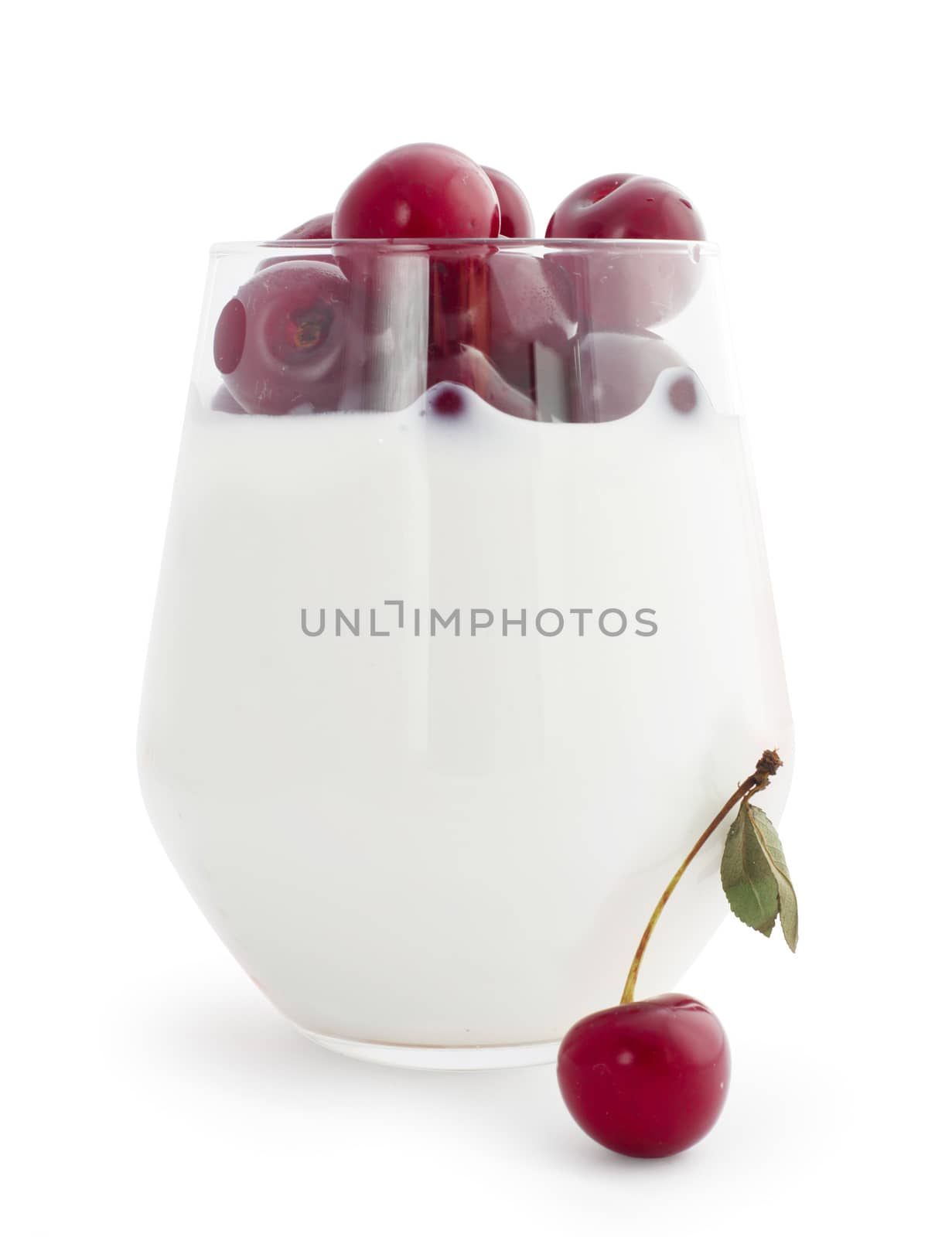 Yogurt and fresh berries cherry studio isolated on white background