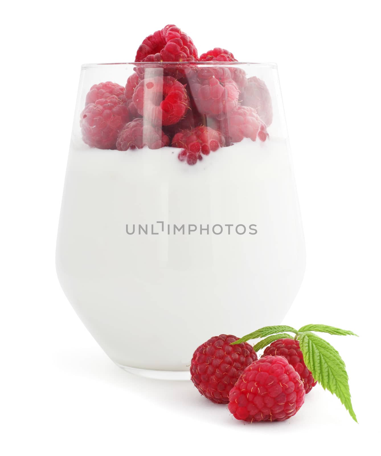 Yogurt and fresh berries raspberry studio isolated on white background