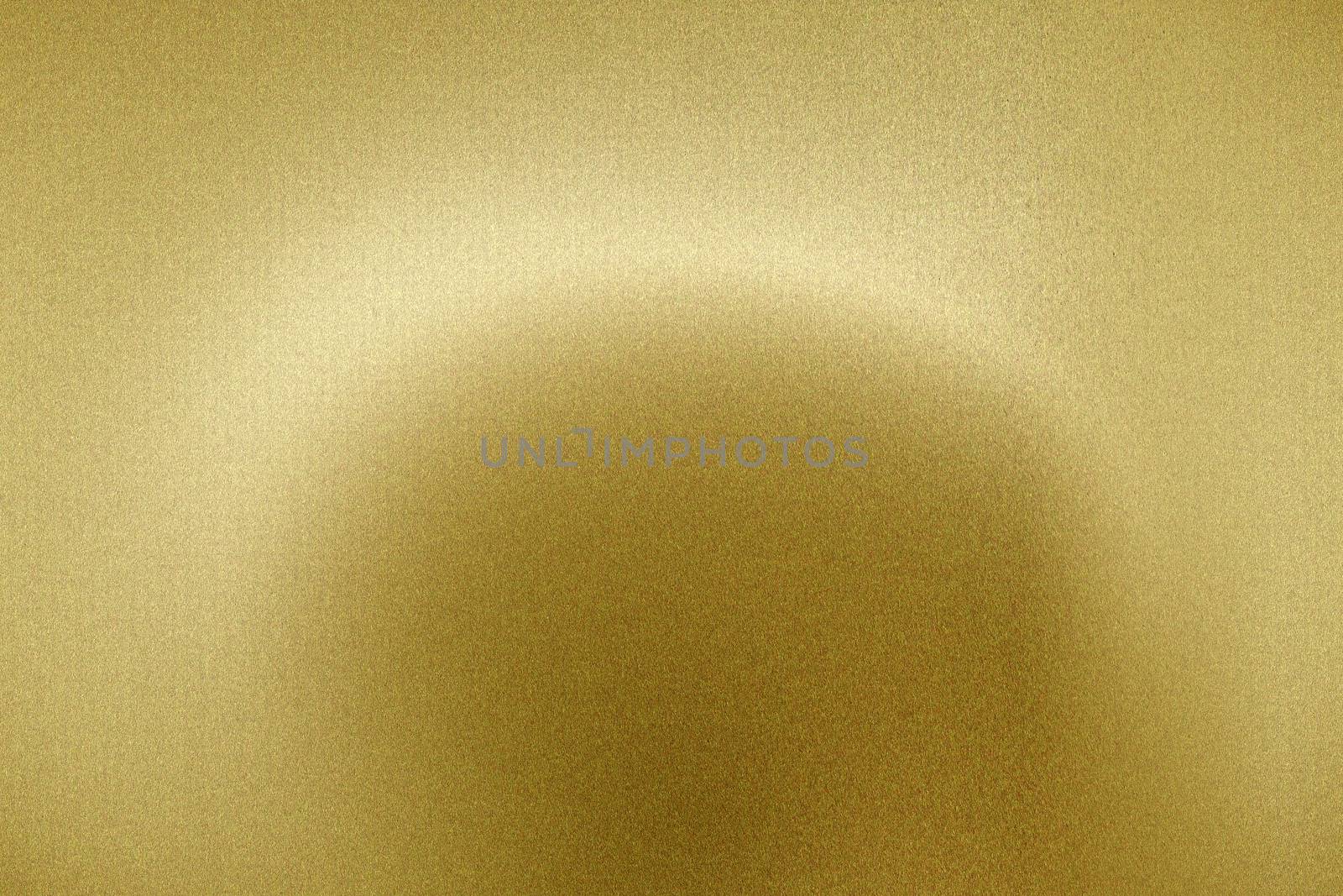 Light shining on brushed gold metal panel, abstract texture background by mouu007